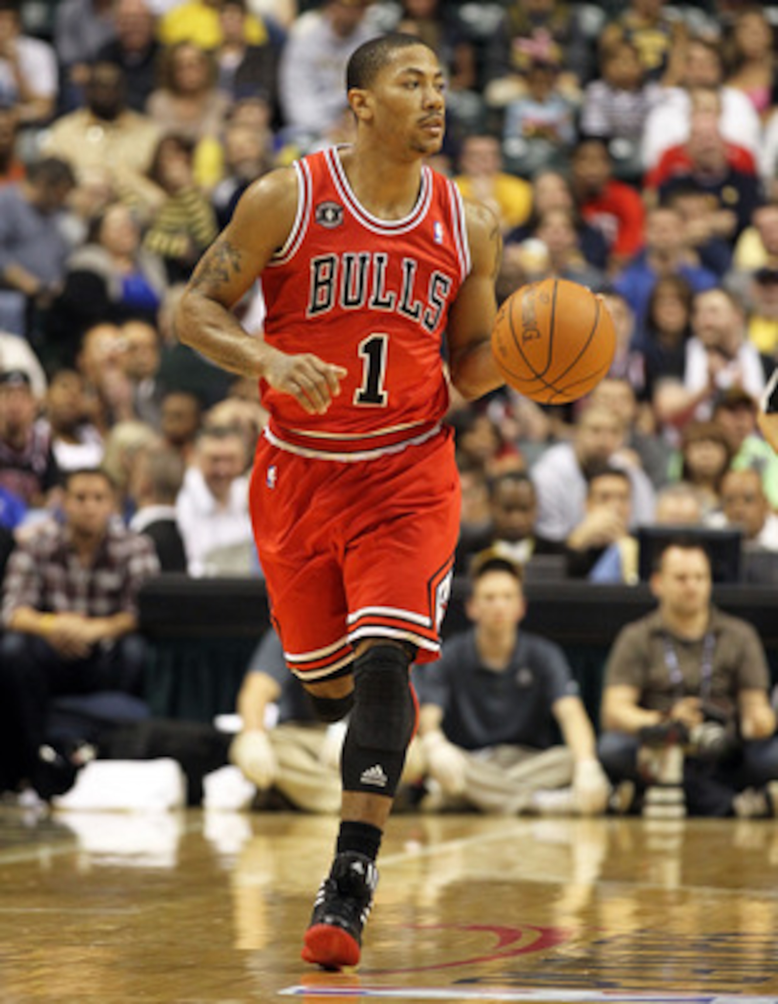 INDIANAPOLIS, IN - APRIL 21:  Derrick Rose #1 of the Chicago Bulls dribbles the ball against the Indiana Pacers in Game three of the Eastern Conference Quarterfinals in the 2011 NBA Playoffs on April 21, 2011  at Conseco Fieldhouse in Indianapolis, Indian