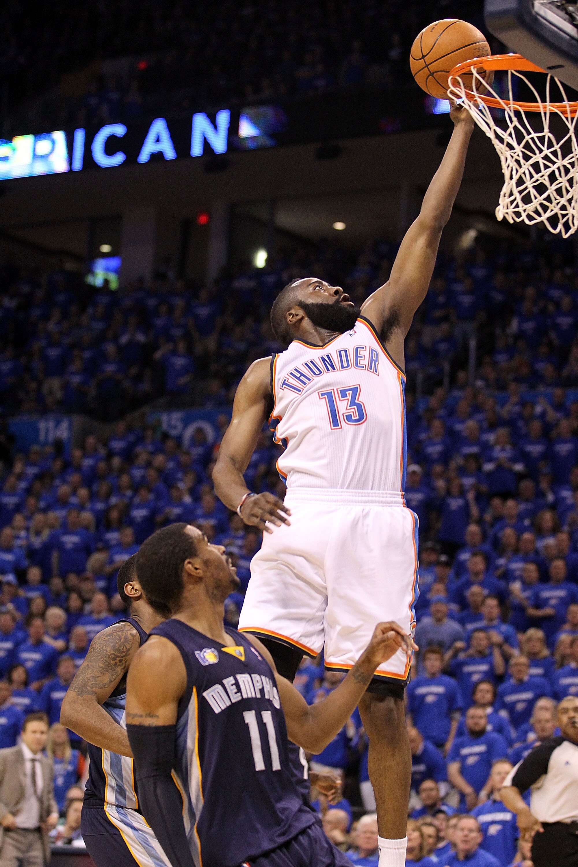 OKLAHOMA CITY, OK - MAY 03:  Guard James Harden #13 of the Oklahoma City Thunder takes a shot against Mike Conley #11 of the Memphis Grizzlies in Game Two of the Western Conference Semifinals in the 2011 NBA Playoffs on May 3, 2011 at Oklahoma City Arena