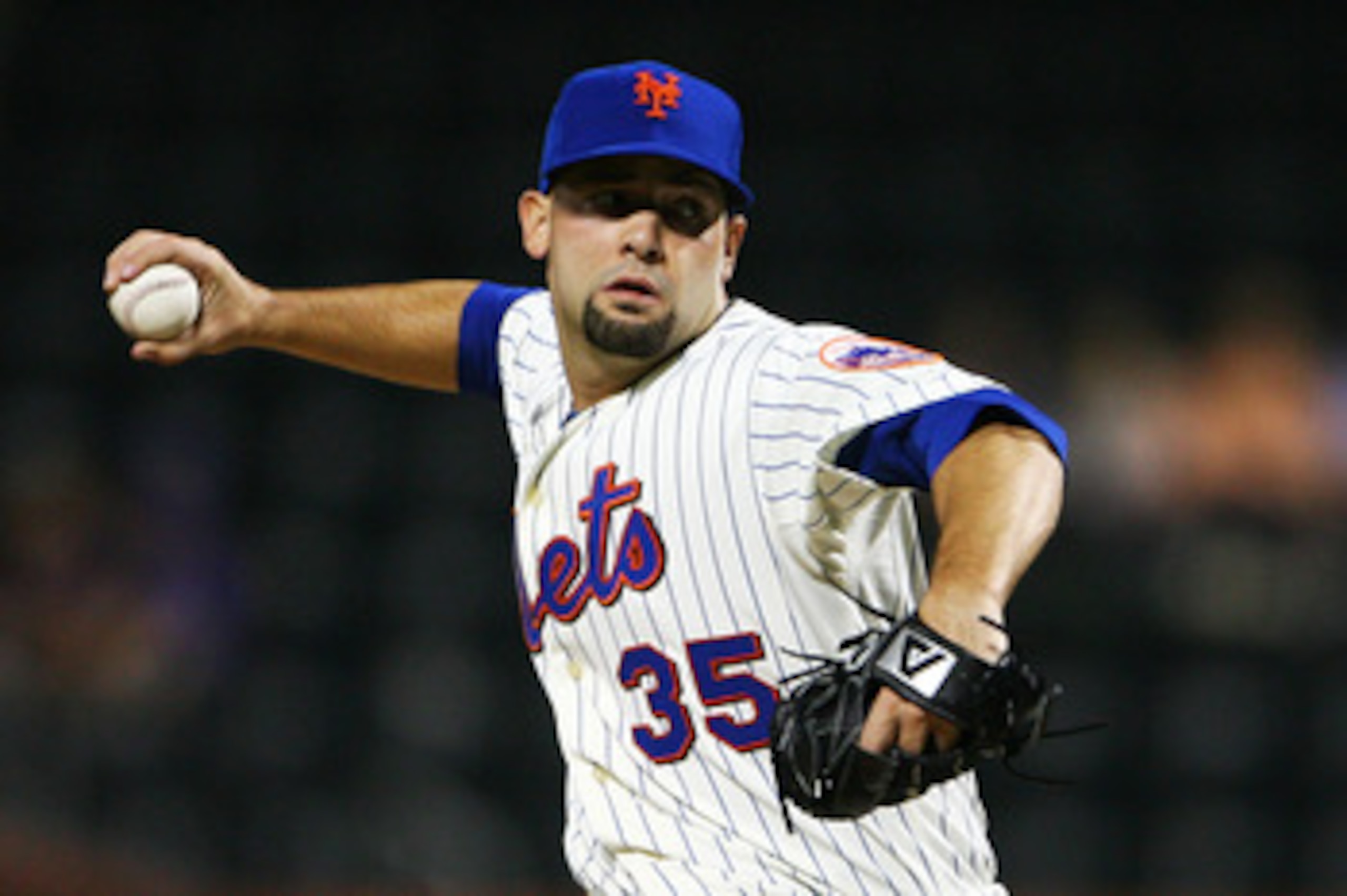 NEW YORK - SEPTEMBER 30:  Dillon Gee #35 of the New York Mets pitches against the Milwaukee Brewers during their game on September 30, 2010 at Citi Field in the Flushing neighborhood of the Queens borough of New York City.  (Photo by Andrew Burton/Getty I