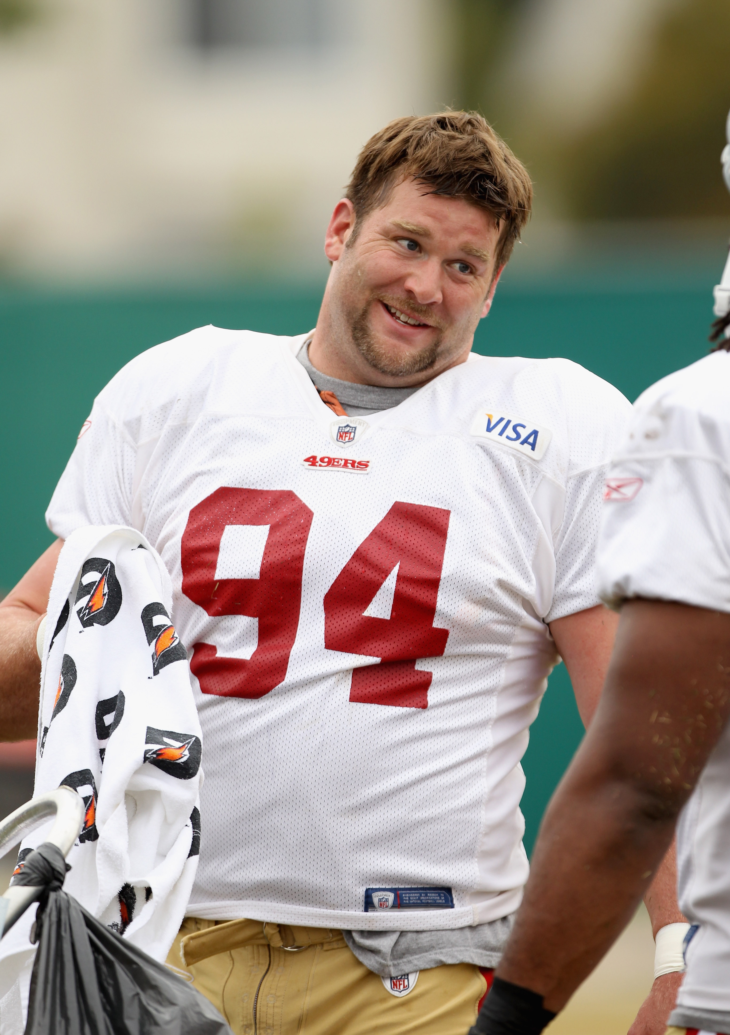 SANTA CLARA, CA - AUGUST 02:  Justin Smith #94 works out during the San Francisco 49ers training camp at their training complex on August 2, 2010 in Santa Clara, California.  (Photo by Ezra Shaw/Getty Images)