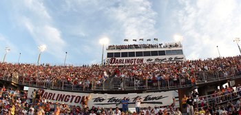 DARLINGTON, SC - MAY 08:  Fans fill the grandstand during the NASCAR Sprint Cup series SHOWTIME Southern 500 at Darlington Raceway on May 8, 2010 in Darlington, South Carolina.  (Photo by Streeter Lecka/Getty Images)