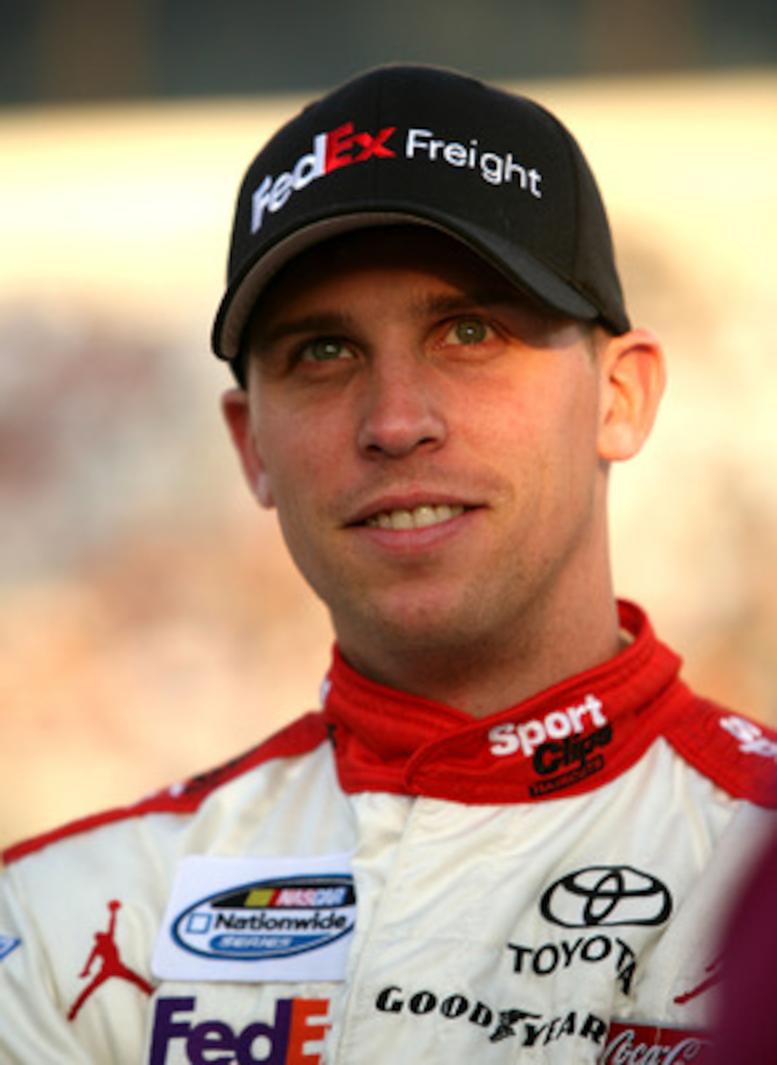 RICHMOND, VA - APRIL 29:  Denny Hamlin, driver of the #20 Sport Clips Toyota, looks on prior to the start of the NASCAR Nationwide Series BUBBA Burger 250 at Richmond International Raceway on April 29, 2011 in Richmond, Virginia.  (Photo by Jerry Markland