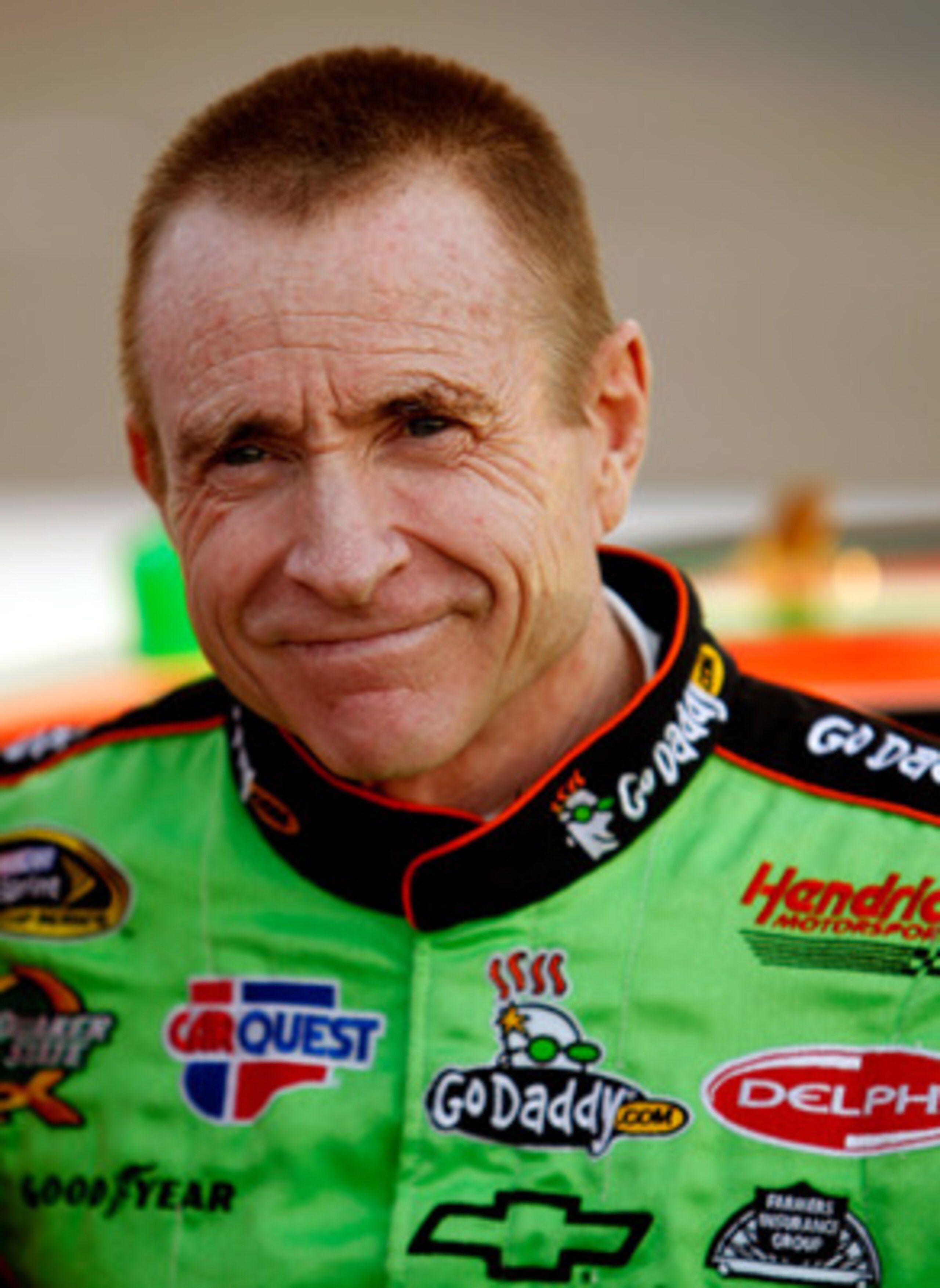 RICHMOND, VA - APRIL 30:  Mark Martin, driver of the #5 GoDaddy.com Chevrolet stands on the grid before the NASCAR Sprint Cup Series Crown Royal Presents The Matthew & Daniel Hansen 400 at Richmond International Raceway on April 30, 2011 in Richmond, Virg