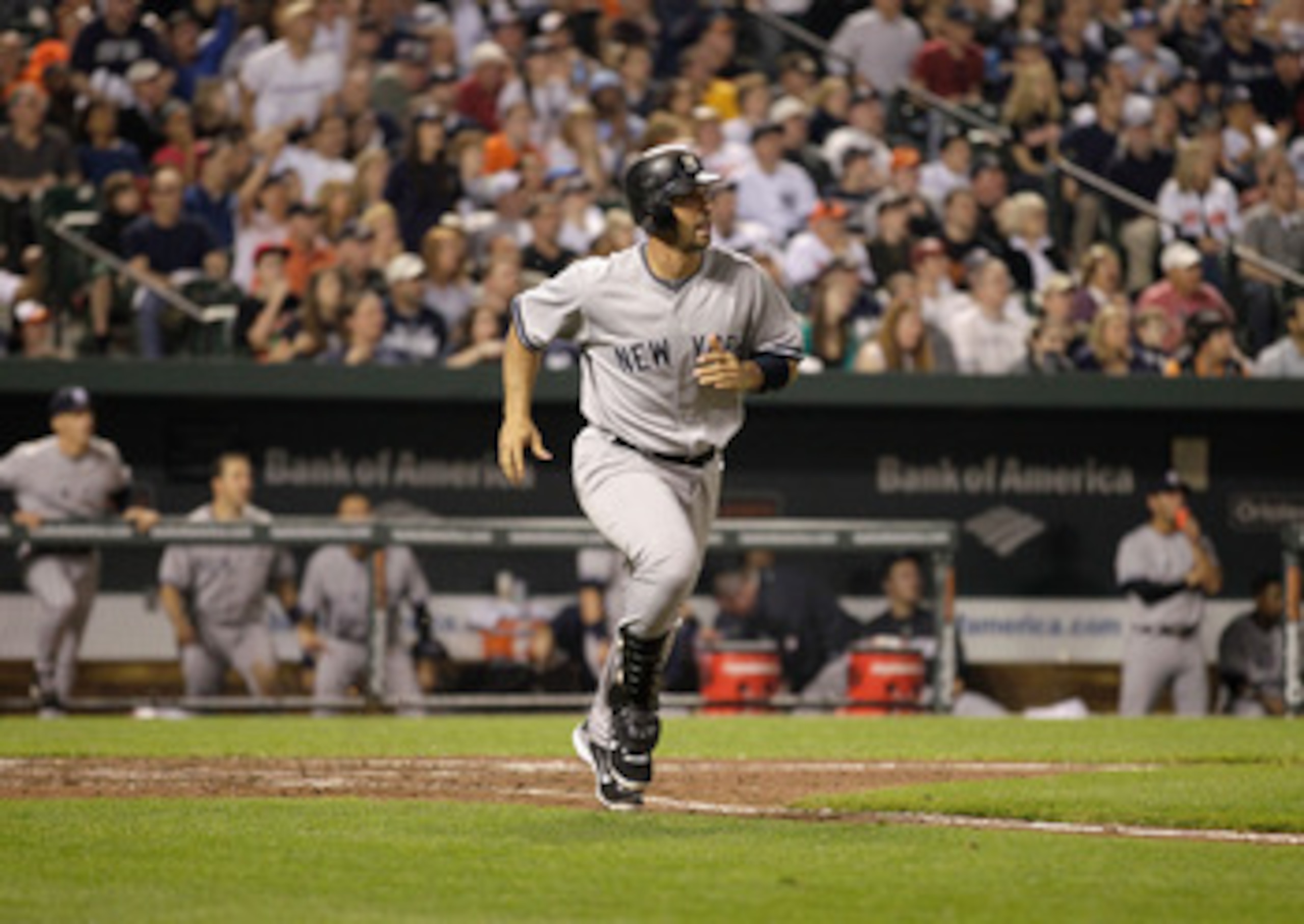 BALTIMORE, MD - APRIL 23:  Jorge Posada #20 of the New York Yankees follows his two RBI homerun against the Baltimore Orioles during the eighth inning at Oriole Park at Camden Yards on April 23, 2011 in Baltimore, Maryland.  (Photo by Rob Carr/Getty Image