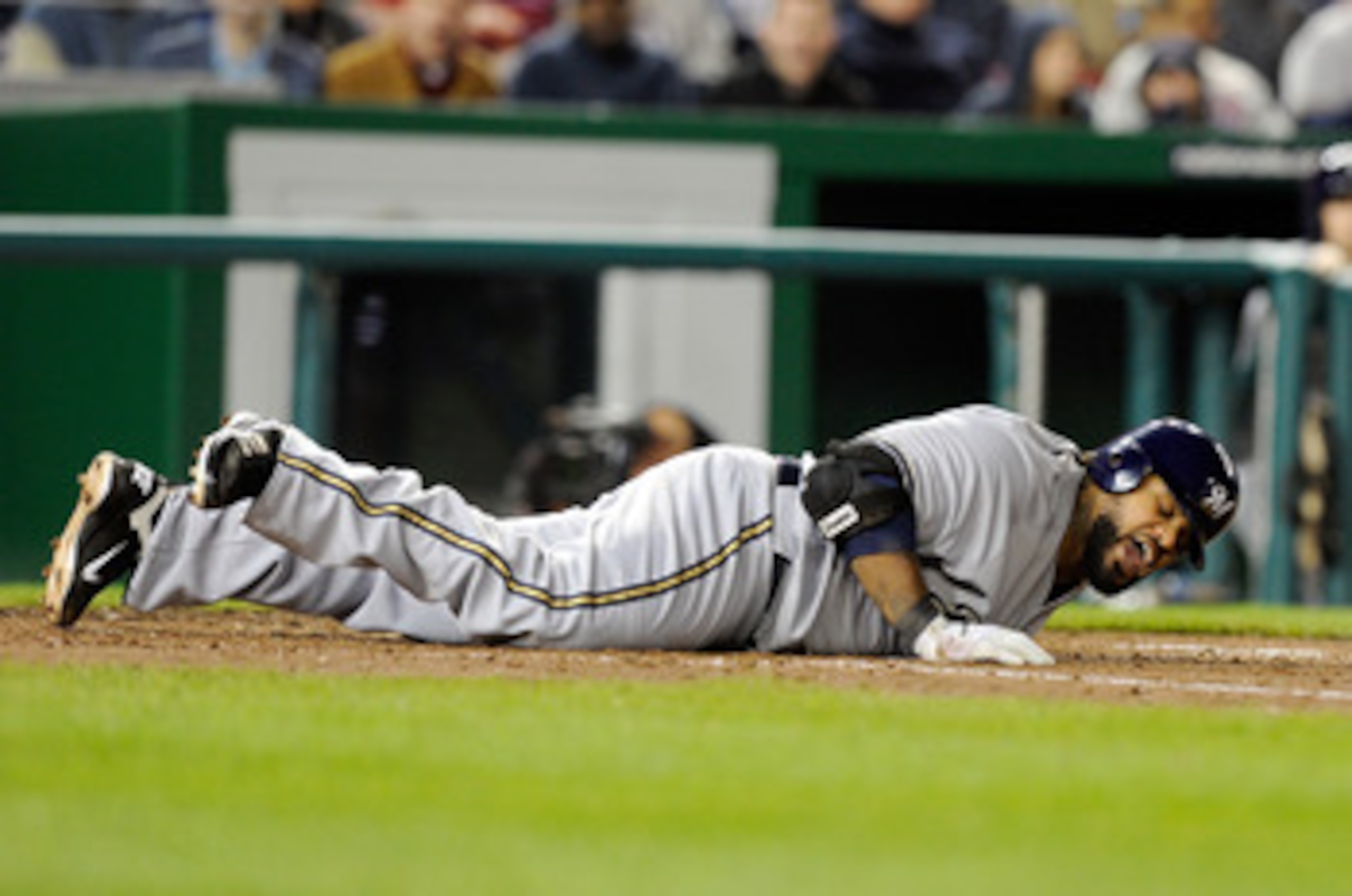 WASHINGTON, DC - APRIL 15:  Prince Fielder #28 of the Milwaukee Brewers reacts after getting hit by a pitch during the game against the Washington Nationals at Nationals Park on April 15, 2011 in Washington, DC. All players, coaches and umpires are wearin