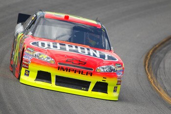 RICHMOND, VA - APRIL 29:  Jeff Gordon, driver of the #24 DuPont Chevrolet, practices for the NASCAR Sprint Cup Series Crown Royal Presents The Matthew & Daniel Hansen 400 at Richmond International Raceway on April 29, 2011 in Richmond, Virginia.  (Photo b