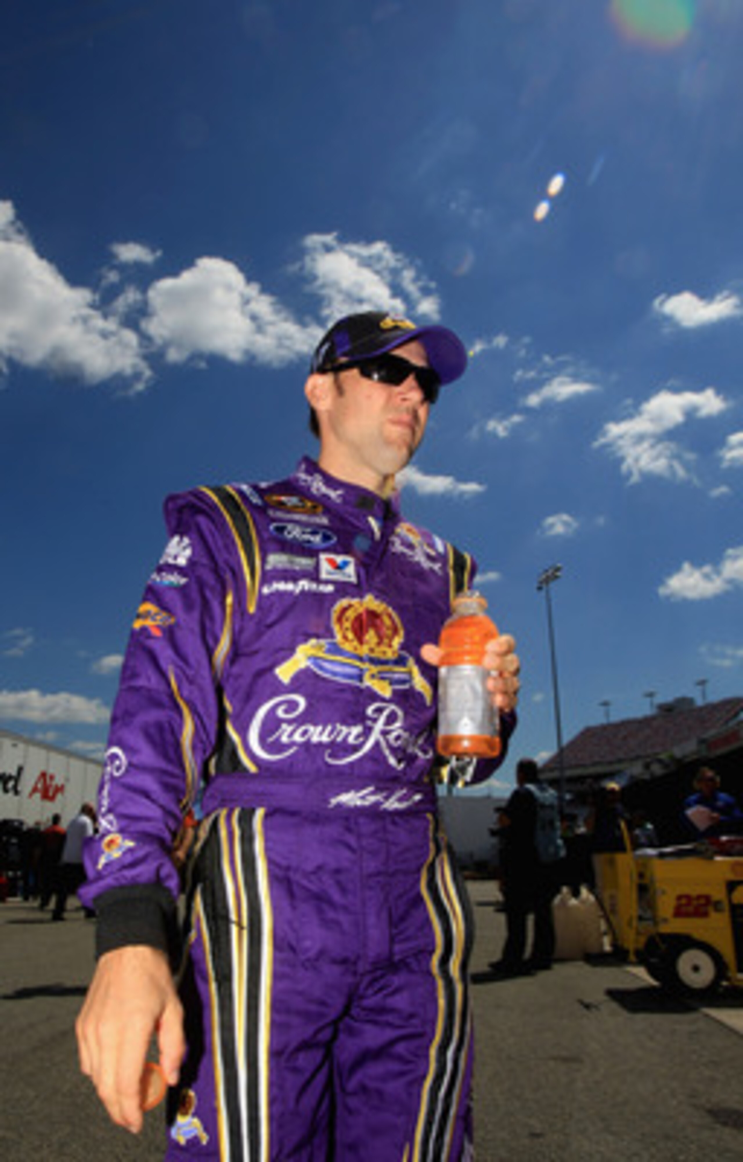 RICHMOND, VA - APRIL 29:  Matt Kenseth, driver of the #17 Crown Royal Ford, walks in the garage area during practice for the NASCAR Sprint Cup Series Crown Royal Presents The Matthew & Daniel Hansen 400 at Richmond International Raceway on April 29, 2011 
