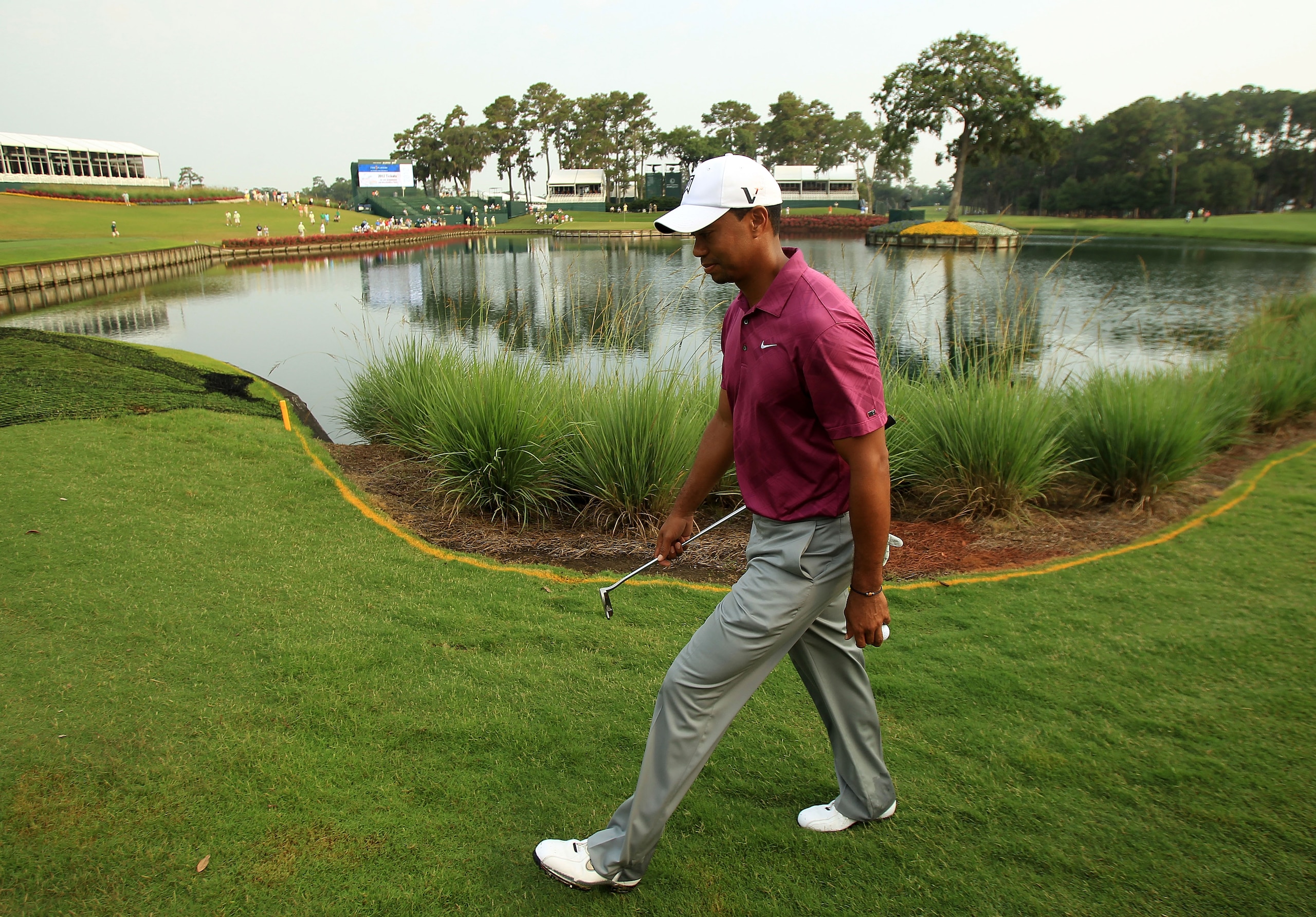 PONTE VEDRA BEACH, FL - MAY 11:  Tiger Woods walks to a tee during a practice round prior to the start of THE PLAYERS Championship held at THE PLAYERS Stadium course at TPC Sawgrass on May 11, 2011 in Ponte Vedra Beach, Florida.  (Photo by Streeter Lecka/