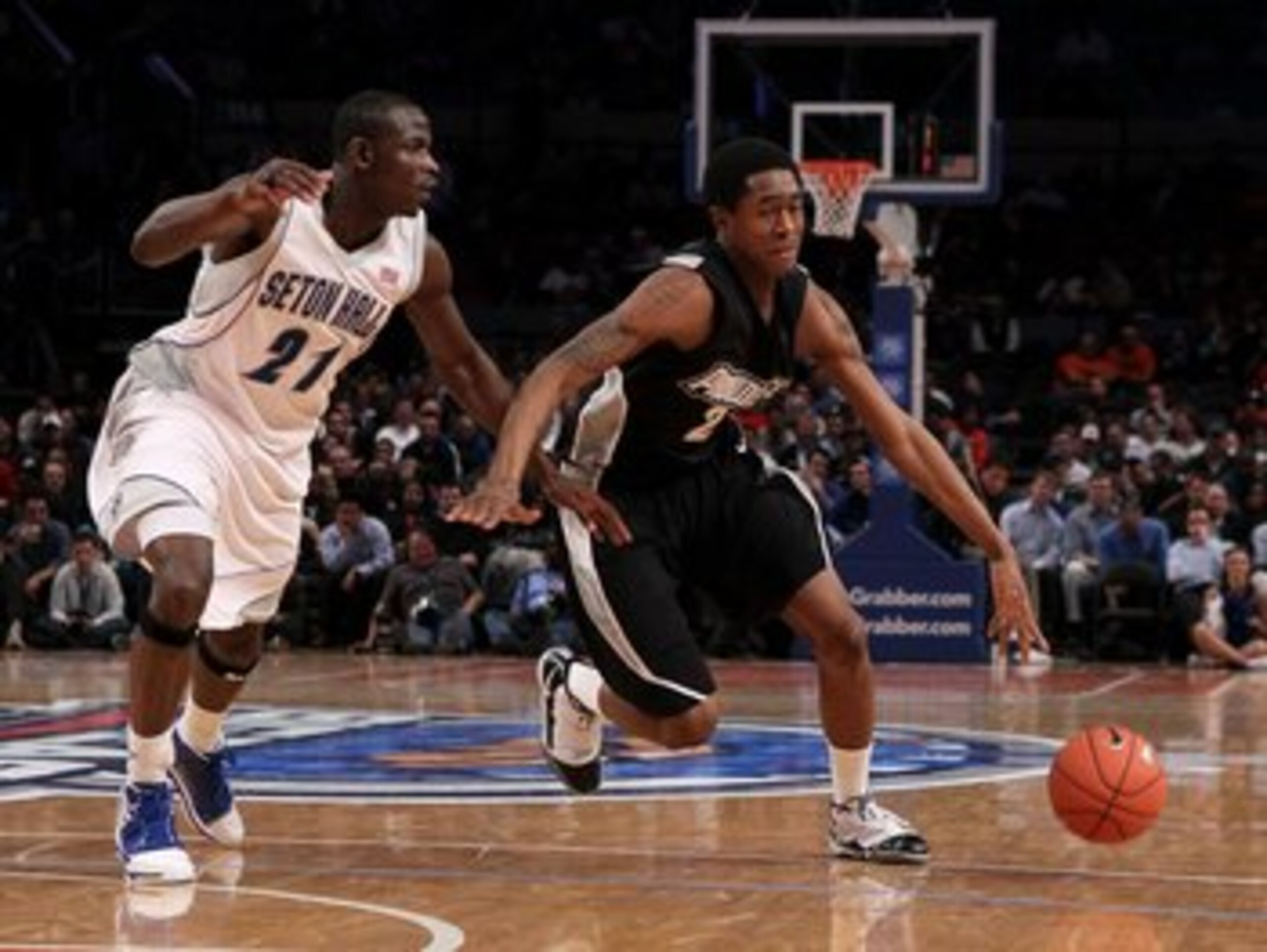 NEW YORK - MARCH 09: Marshon Brooks #2 of the Providence Friars handles the ball against Jeremy Hazell #21 of the Seton Hall Pirates during the first round game of the Big East Basketball Tournament at Madison Square Garden on March 9, 2010 in New York, N