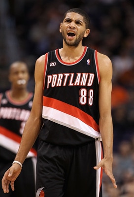 PHOENIX, AZ - JANUARY 14:  Nicolas Batum #88 of the Portland Trail Blazers reacts during the NBA game against the Phoenix Suns at US Airways Center on January 14, 2011 in Phoenix, Arizona.  The Suns defeated the 115-111.  NOTE TO USER: User expressly ackn