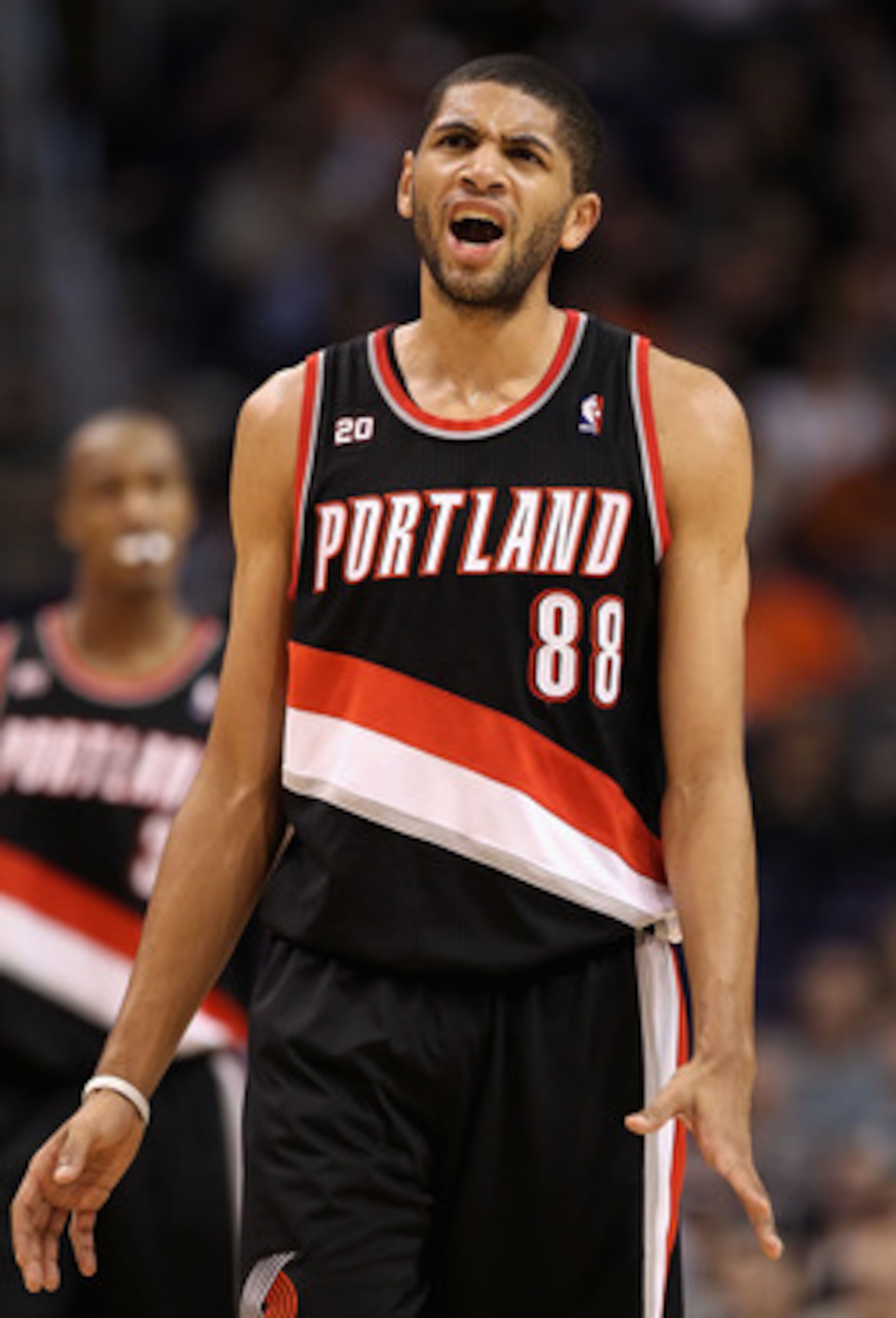 PHOENIX, AZ - JANUARY 14:  Nicolas Batum #88 of the Portland Trail Blazers reacts during the NBA game against the Phoenix Suns at US Airways Center on January 14, 2011 in Phoenix, Arizona.  The Suns defeated the 115-111.  NOTE TO USER: User expressly ackn