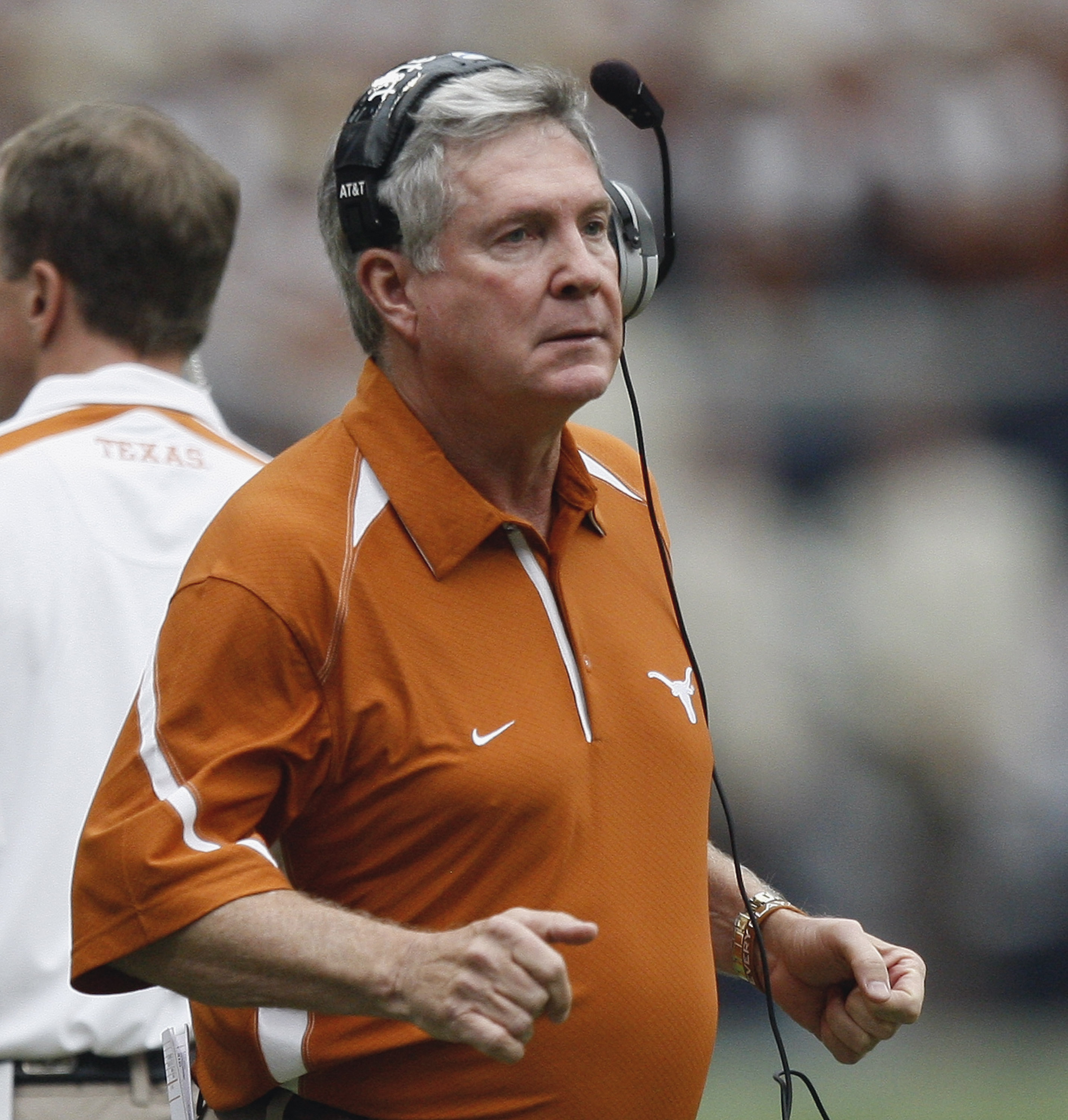 HOUSTON - SEPTEMBER 04:  Head coach Mack Brown of the Texas Longhorns looks on from the sidelines during the season opener against the Rice Owls at Reliant Stadium on September 4, 2010 in Houston, Texas.  (Photo by Bob Levey/Getty Images)