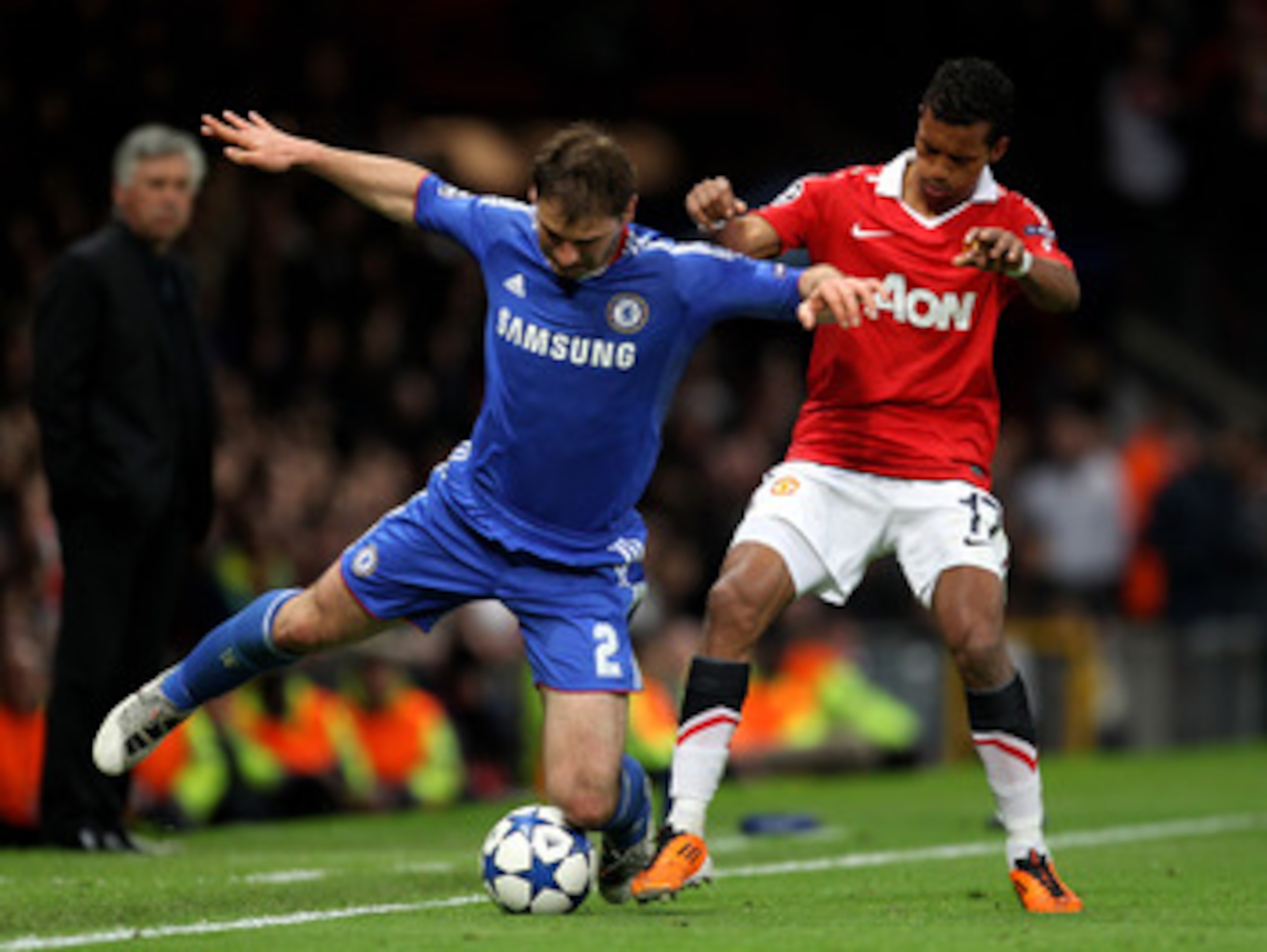 MANCHESTER, ENGLAND - APRIL 12:  Branislav Ivanovic of Chelsea competes with Nani of Manchester United during the UEFA Champions League Quarter Final second leg match between Manchester United and Chelsea at Old Trafford on April 12, 2011 in Manchester, E