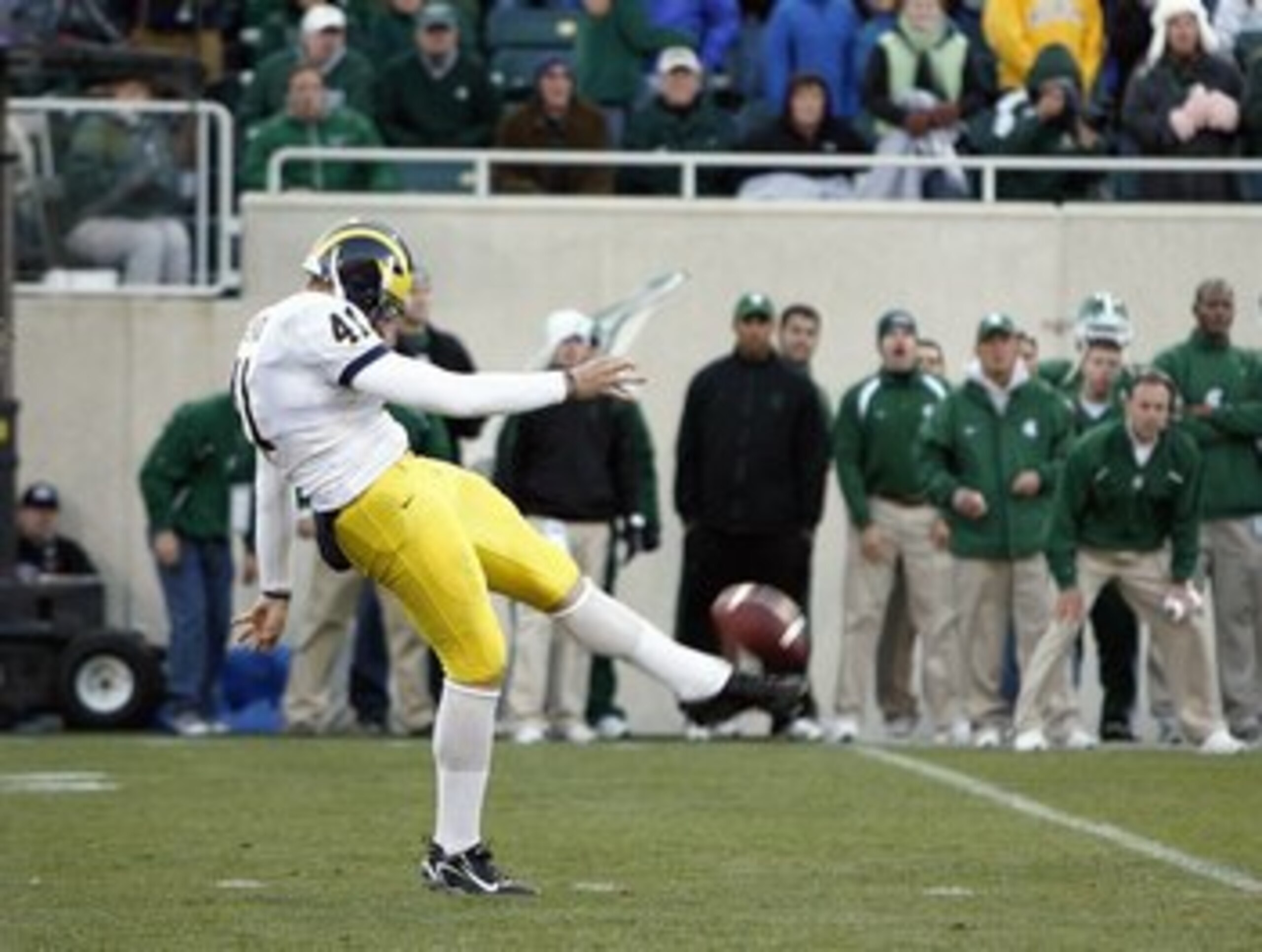 EAST LANSING, MI - NOVEMBER 3: Zoltan Mesko #41 of the Michigan Wolverines punts the ball during the game against the Michigan State Spartans at Spartan Stadium November 3, 2007 in East Lansing, Michigan.  Michigan defeated Michigan State 28-24. (Photo by