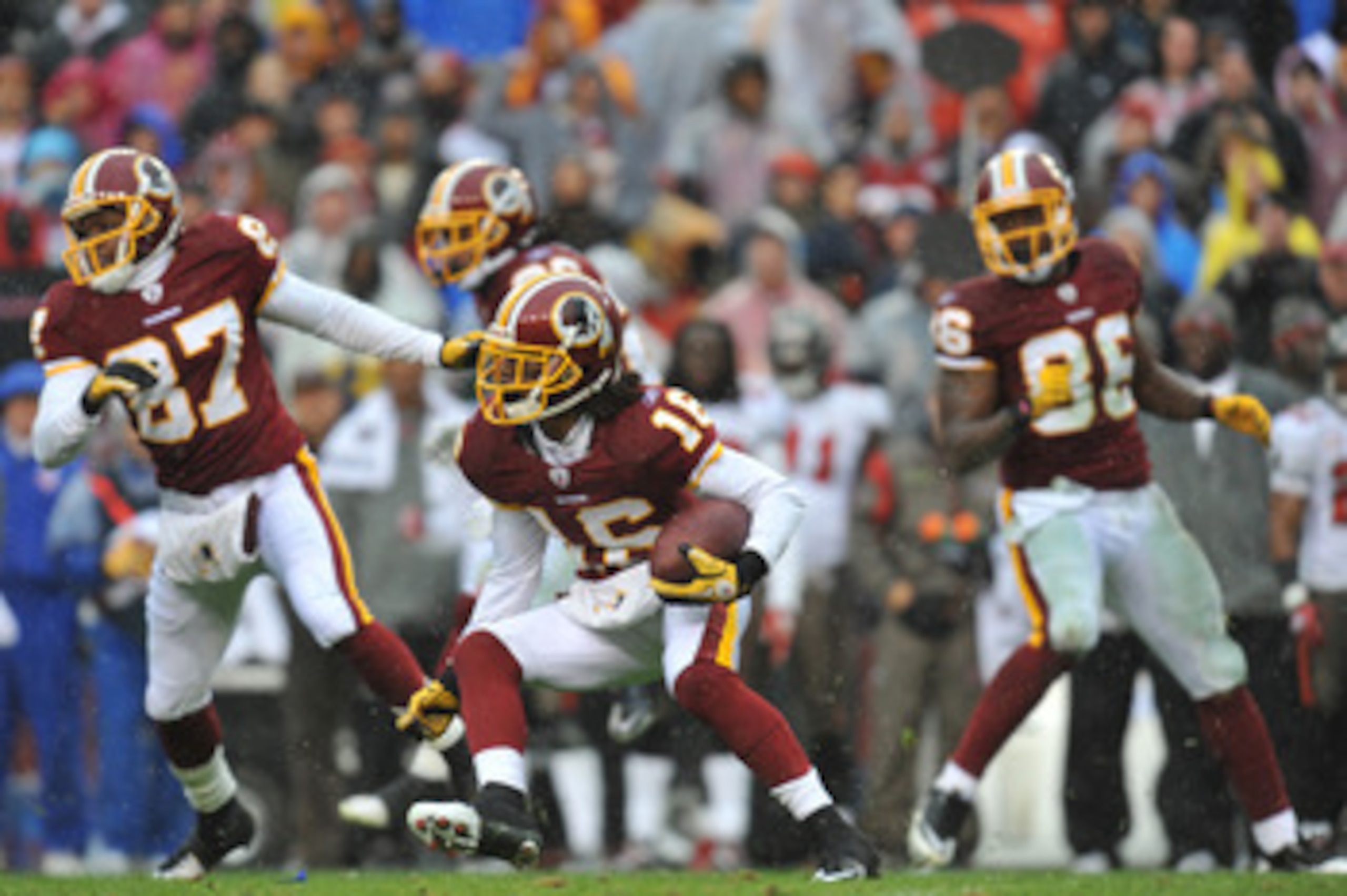 LANDOVER, MD - DECEMBER 12:  Brandon Banks #16 of the Washington Redskins runs the ball during the game against the Tampa Bay Buccaneers  at FedExField on December 12, 2010 in Landover, Maryland. The Buccaneers defeated the Redskins 17-16. (Photo by Larry