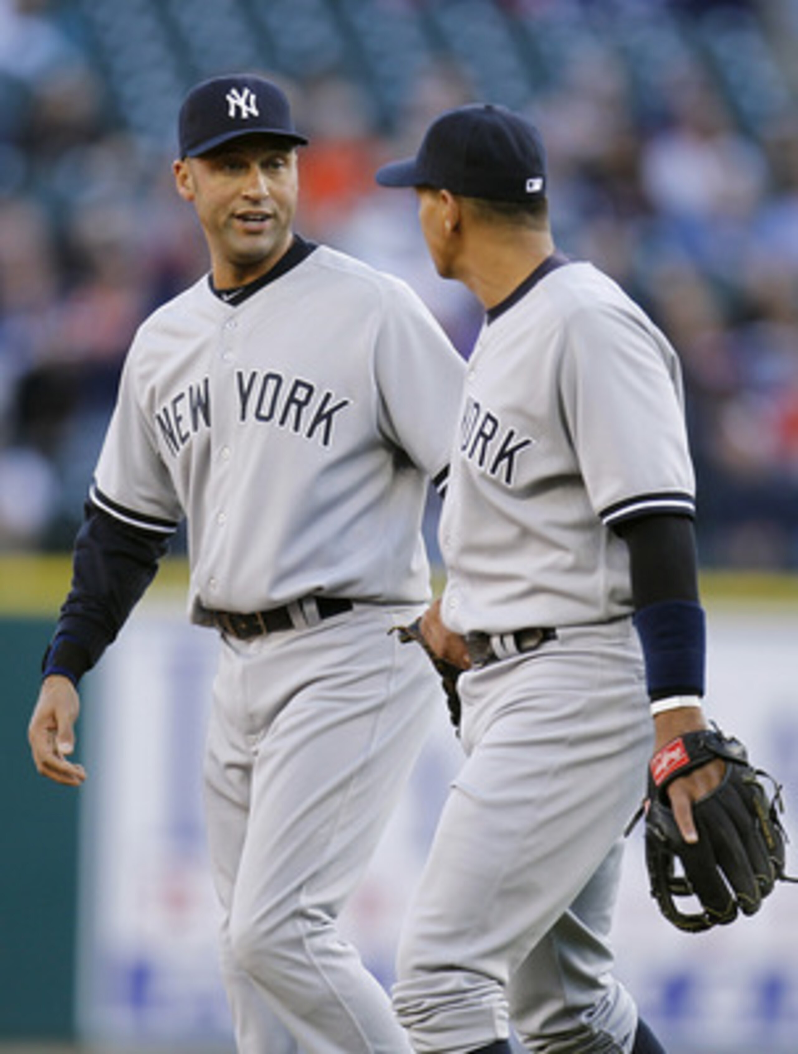 DETROIT, MI - MAY 04: Derek Jeter #2 of the New York Yankees talks with Alex Rodriguez #13 while playing the Detroit Tigers at Comerica Park on May 4, 2011 in Detroit, Michigan. Detroit won the game 4-0.(Photo by Gregory Shamus/Getty Images)