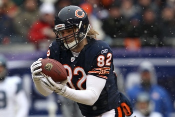 CHICAGO, IL - JANUARY 16: Tight end Greg Olsen #82 of the Chicago Bears catches a 58-yard touchdown in the first quarter in front of Lawyer Milloy #36 of the Seattle Seahawks in the 2011 NFC divisional playoff game at Soldier Field on January 16, 2011 in CHICAGO, IL - JANUARY 16: Tight end Greg Olsen #82 of the Chicago Bears catches a 58-yard touchdown in the first quarter in front of Lawyer Milloy #36 of the Seattle Seahawks in the 2011 NFC divisional playoff game at Soldier Field on January 16, 2011 in