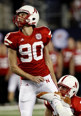 ARLINGTON, TX - DECEMBER 5:  Kicker Alex Henery of the Nebraska Cornhuskers watches his field goal in the first quarter against the Texas Longhorns at Cowboys Stadium on December 5, 2009 in Arlington, Texas.  (Photo by Ronald Martinez/Getty Images)