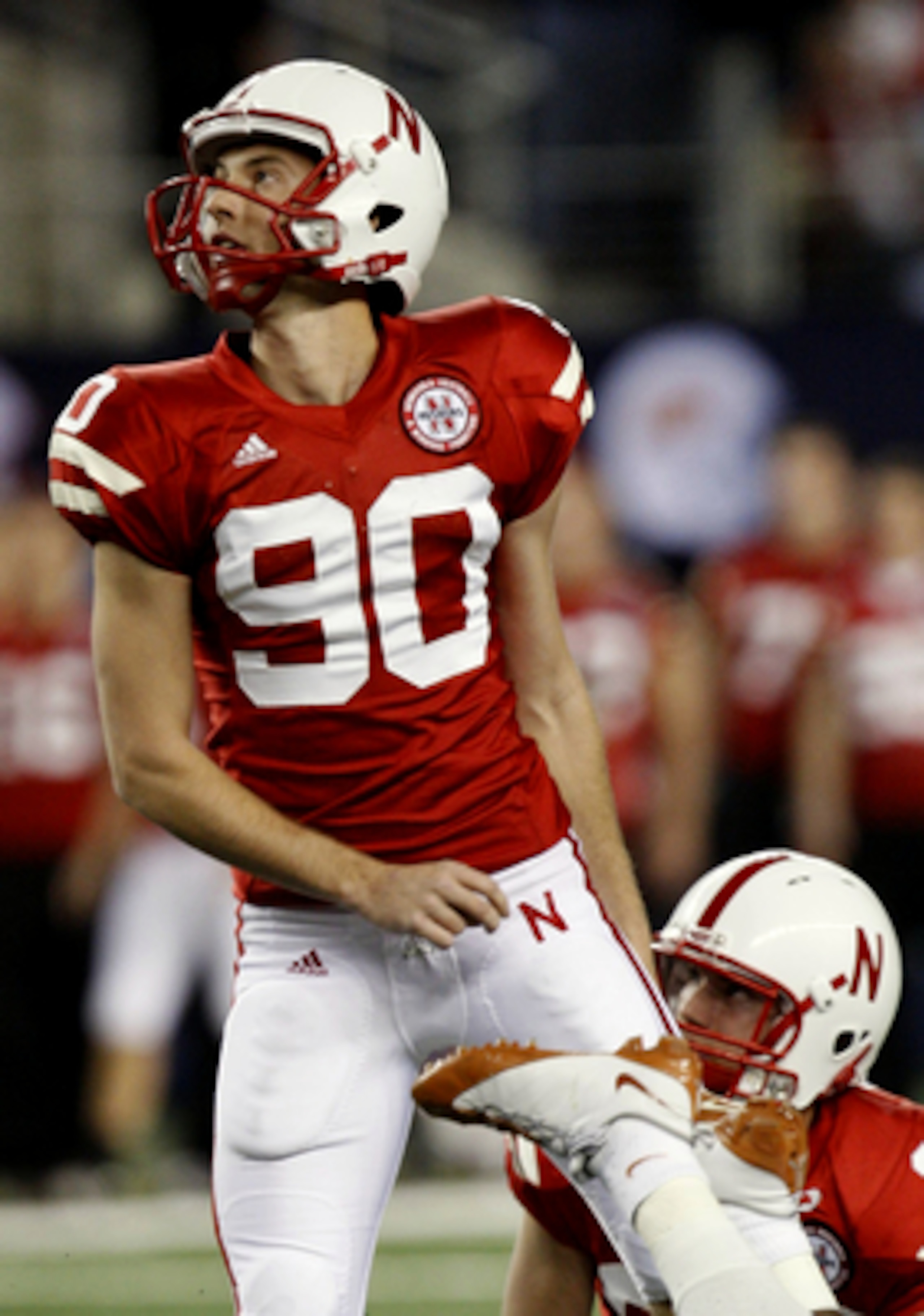 ARLINGTON, TX - DECEMBER 5:  Kicker Alex Henery of the Nebraska Cornhuskers watches his field goal in the first quarter against the Texas Longhorns at Cowboys Stadium on December 5, 2009 in Arlington, Texas.  (Photo by Ronald Martinez/Getty Images)