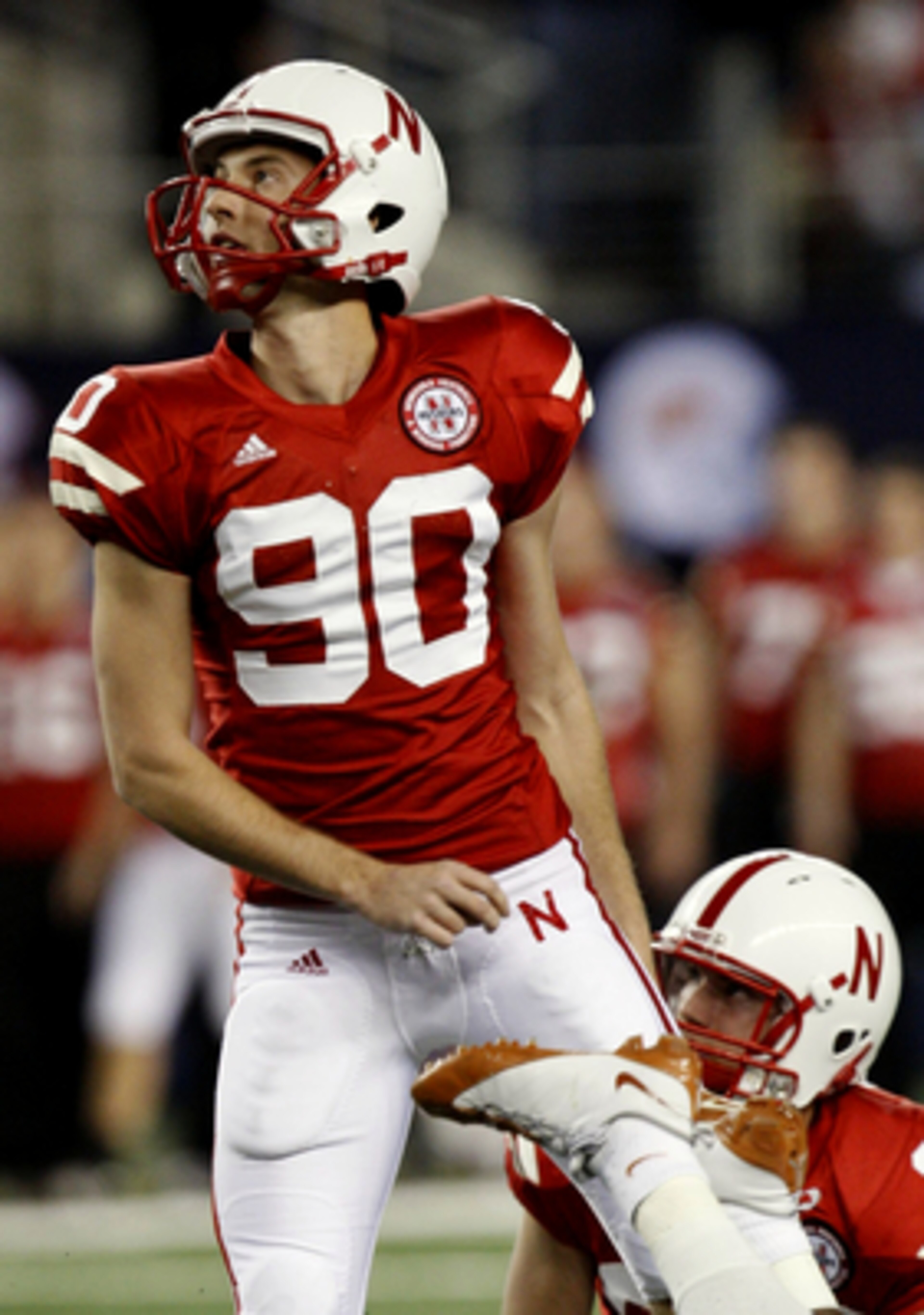 ARLINGTON, TX - DECEMBER 5:  Kicker Alex Henery of the Nebraska Cornhuskers watches his field goal in the first quarter against the Texas Longhorns at Cowboys Stadium on December 5, 2009 in Arlington, Texas.  (Photo by Ronald Martinez/Getty Images)