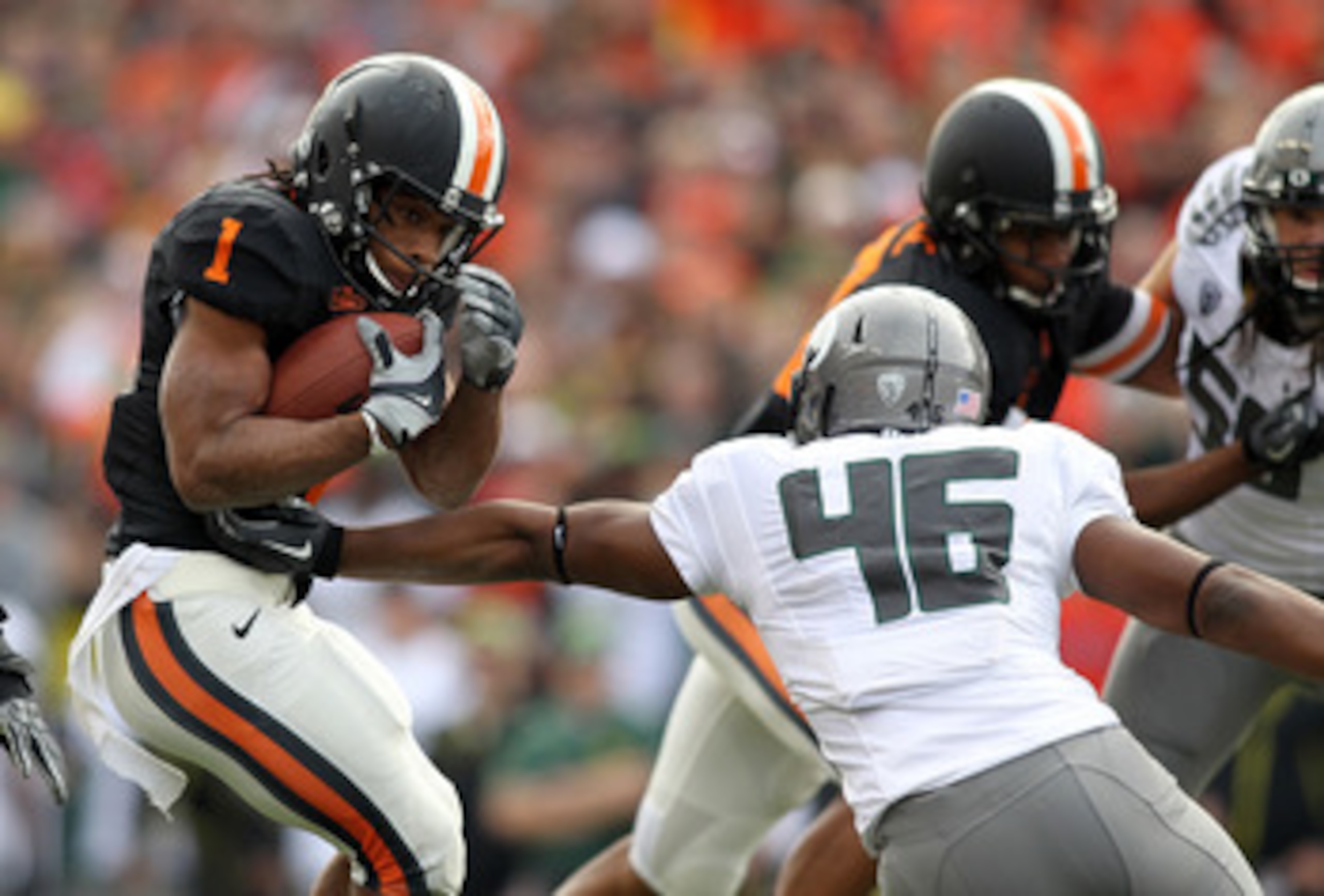 CORVALLIS, OR - DECEMBER 04: Jacquizz Rodgers #1 of the Oregon State Beavers runs the ball against Michael Clay #46 of the Oregon Ducks during the 114th Civil War on December 4, 2010 at the Reser Stadium in Corvallis, Oregon. (Photo by Jonathan Ferrey/G CORVALLIS, OR - DECEMBER 04: Jacquizz Rodgers #1 of the Oregon State Beavers runs the ball against Michael Clay #46 of the Oregon Ducks during the 114th Civil War on December 4, 2010 at the Reser Stadium in Corvallis, Oregon. (Photo by Jonathan Ferrey/G