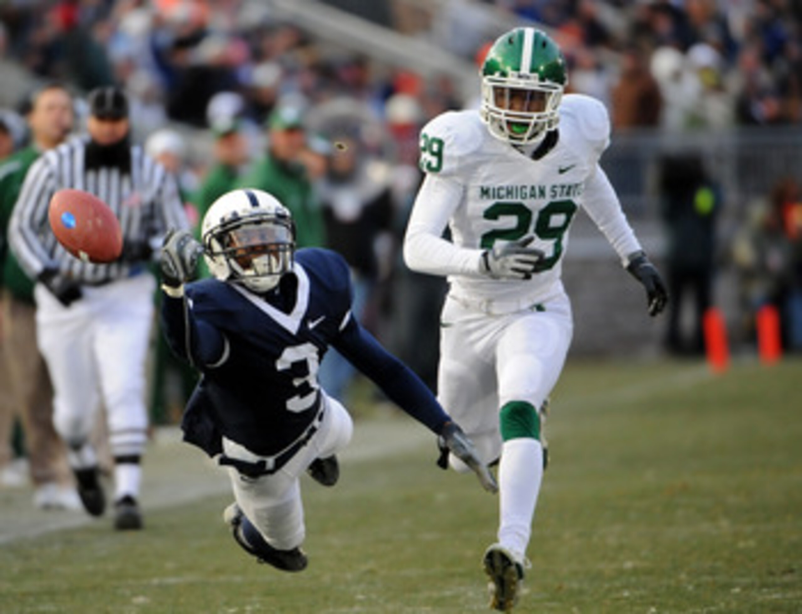 STATE COLLEGE, PA - NOVEMBER 22: Deon Butler #3 of the Penn State Nittany Lions can't haul in a pass in front of Chris L. Rucker #29 of the Michigan State Spartans on November 22, 2008 at Beaver Stadium in State College, Pennsylvania. Penn State won the STATE COLLEGE, PA - NOVEMBER 22: Deon Butler #3 of the Penn State Nittany Lions can't haul in a pass in front of Chris L. Rucker #29 of the Michigan State Spartans on November 22, 2008 at Beaver Stadium in State College, Pennsylvania. Penn State won the