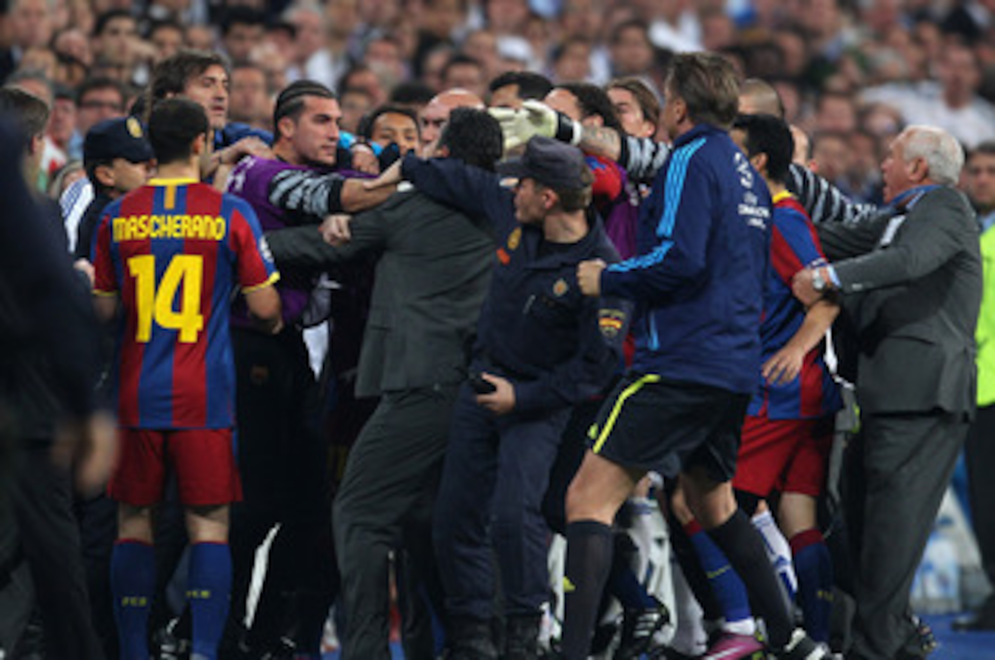 MADRID, SPAIN - APRIL 27: Jose Pinto of Barcelona clashes with Real Madrid official as the players leave the pitch at half time during the UEFA Champions League Semi Final first leg match between Real Madrid and Barcelona at Estadio Santiago Bernabeu on MADRID, SPAIN - APRIL 27: Jose Pinto of Barcelona clashes with Real Madrid official as the players leave the pitch at half time during the UEFA Champions League Semi Final first leg match between Real Madrid and Barcelona at Estadio Santiago Bernabeu on