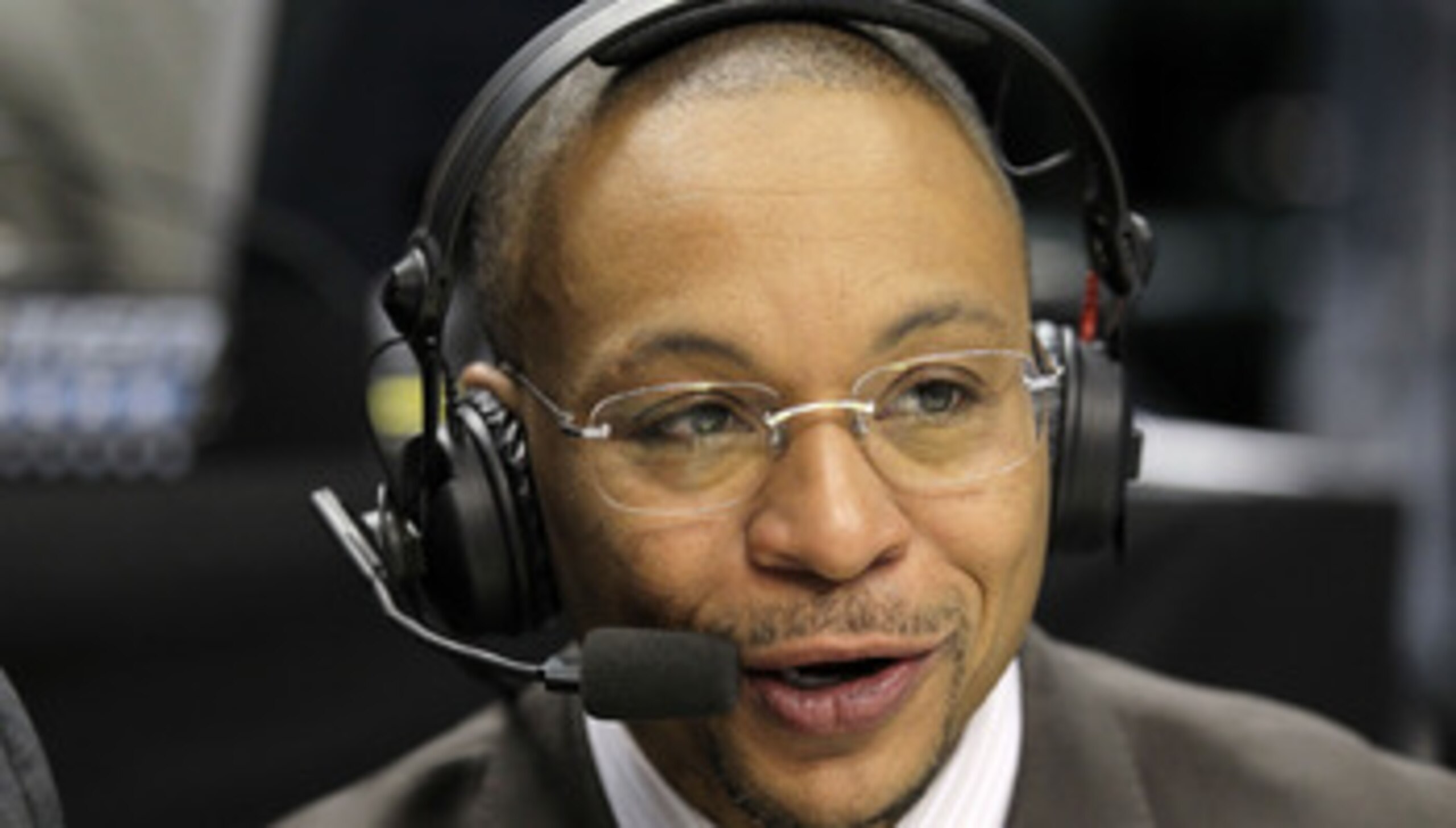 INDIANAPOLIS, IN - MARCH 10:  Big Ten Network announcer Gus Johnson calls the game between the Penn State Nittany Lions and the Indiana Hoosiers during the first round of the 2011 Big Ten Men's Basketball Tournament at Conseco Fieldhouse on March 10, 2011