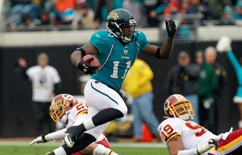 JACKSONVILLE, FL - DECEMBER 26:  Mike Sims-Walker #11 of the Jacksonville Jaguars runs after making a reception during the game against the Washington Redskins at EverBank Field on December 26, 2010 in Jacksonville, Florida.  (Photo by Sam Greenwood/Getty