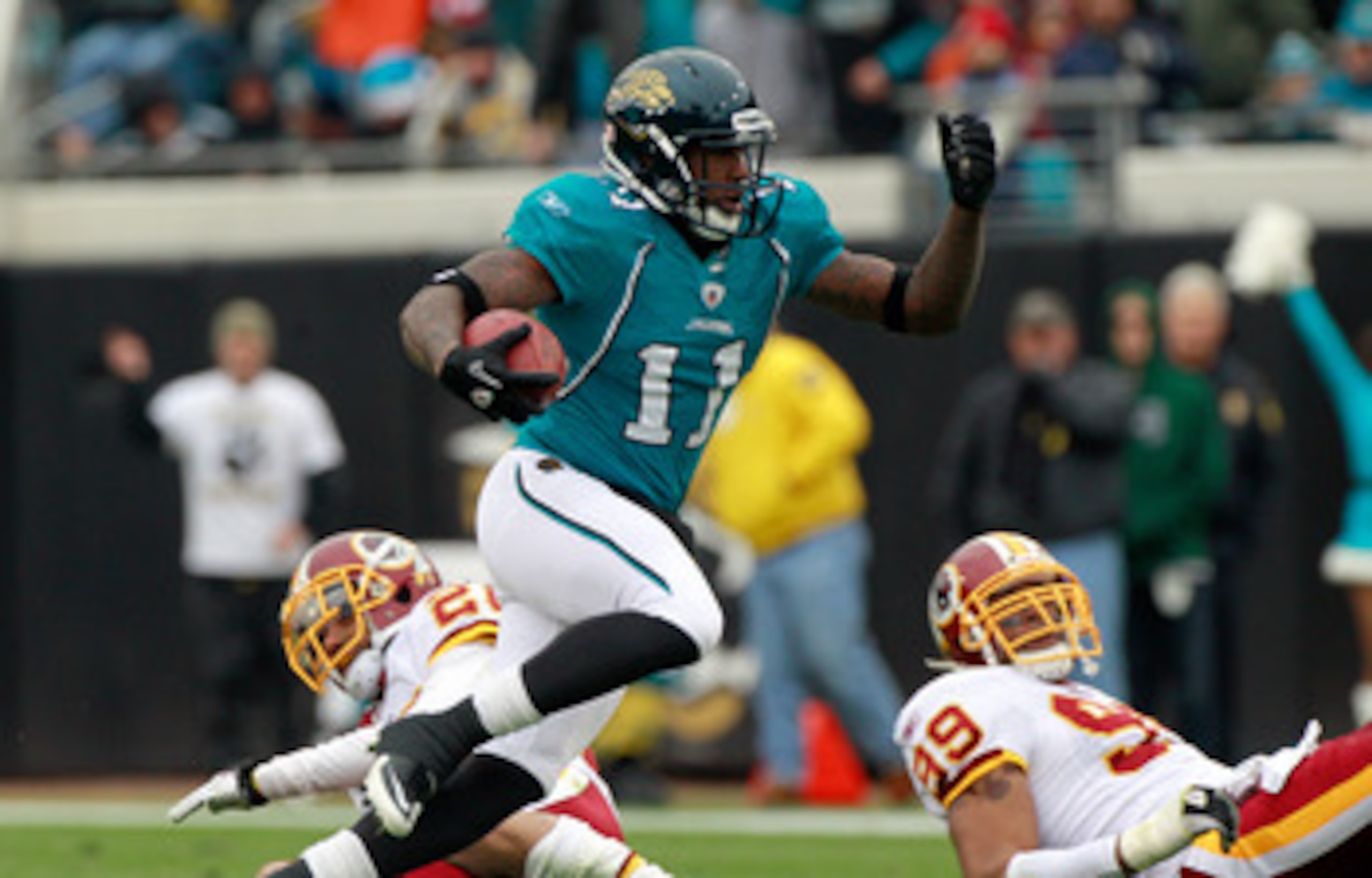 JACKSONVILLE, FL - DECEMBER 26: Mike Sims-Walker #11 of the Jacksonville Jaguars runs after making a reception during the game against the Washington Redskins at EverBank Field on December 26, 2010 in Jacksonville, Florida. (Photo by Sam Greenwood/Getty JACKSONVILLE, FL - DECEMBER 26: Mike Sims-Walker #11 of the Jacksonville Jaguars runs after making a reception during the game against the Washington Redskins at EverBank Field on December 26, 2010 in Jacksonville, Florida. (Photo by Sam Greenwood/Getty