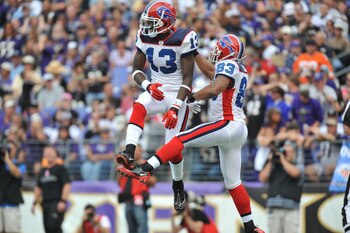 BALTIMORE, MD - OCTOBER 24:  Steve Johnson #13 and Lee Evans #83 of the Buffalo Bills celebrate Lee's touchdown against the Baltimore Ravens at M&T Bank Stadium on October 24, 2010 in Baltimore, Maryland. The Ravens defeated the Bills 37-34. (Photo by Lar