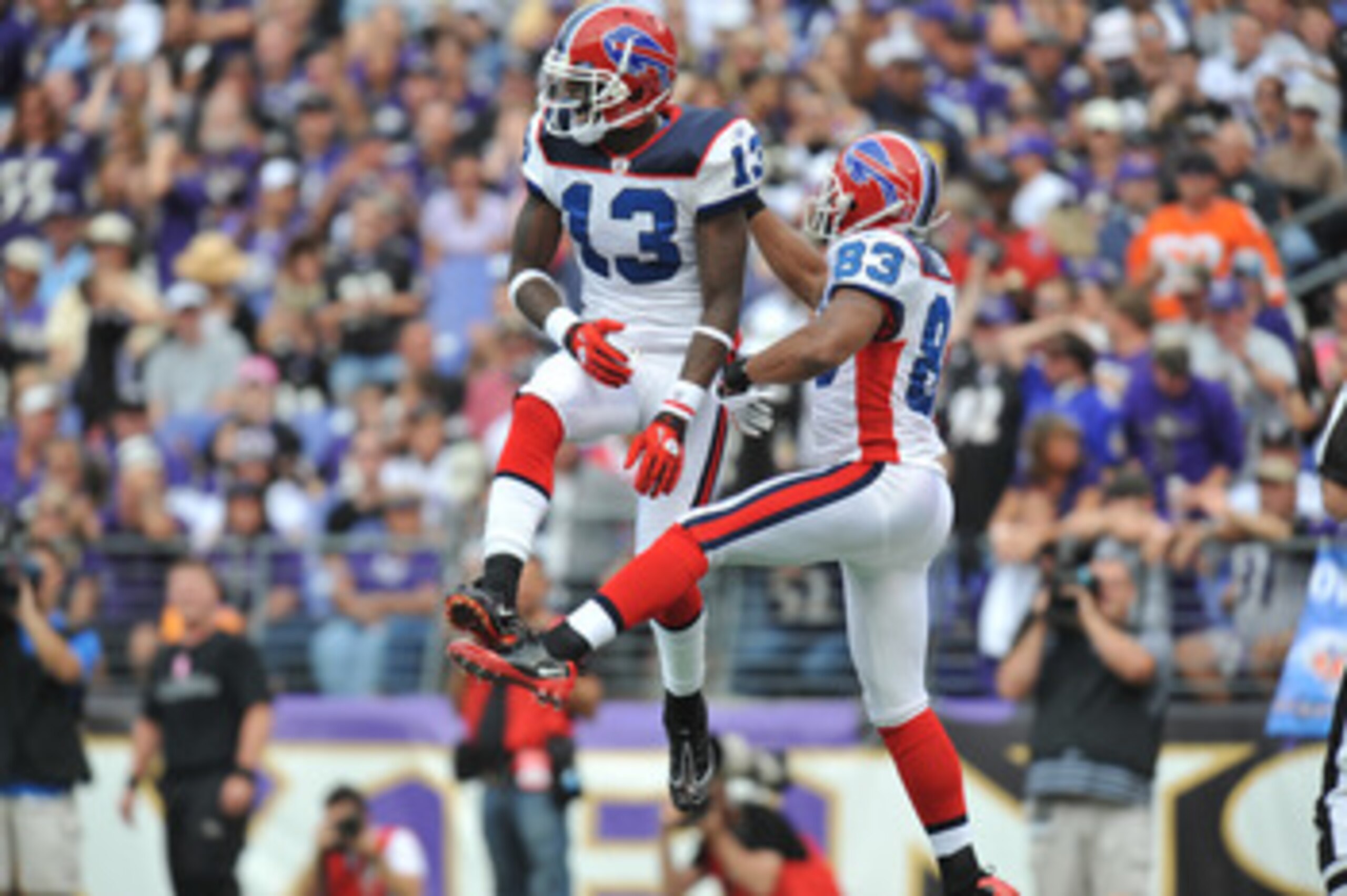 BALTIMORE, MD - OCTOBER 24:  Steve Johnson #13 and Lee Evans #83 of the Buffalo Bills celebrate Lee's touchdown against the Baltimore Ravens at M&T Bank Stadium on October 24, 2010 in Baltimore, Maryland. The Ravens defeated the Bills 37-34. (Photo by Lar