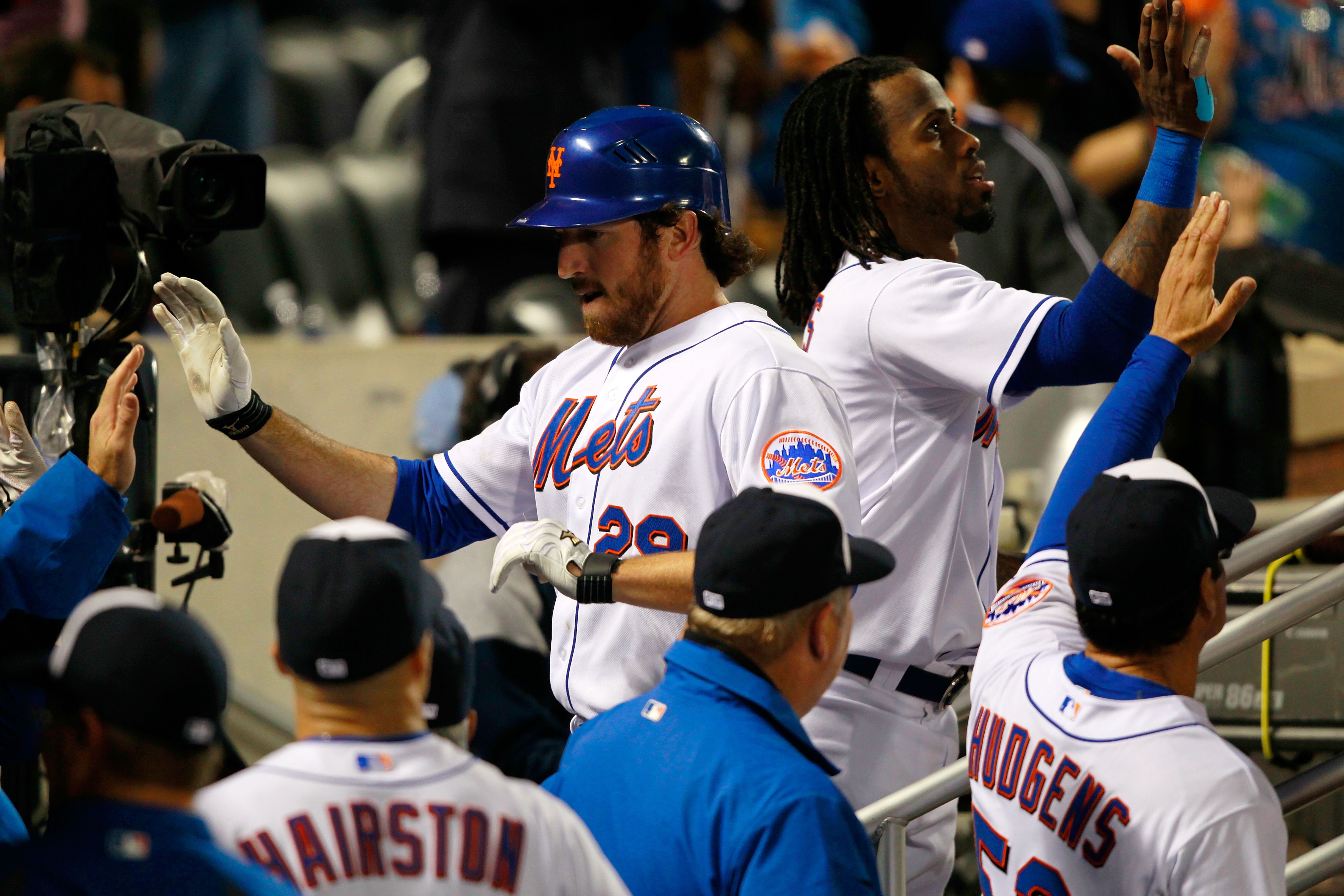 NEW YORK, NY - MAY 03: Ike Davis #29 of the New York Mets is congratulated by his teammates on his two run homer on a line drive to right field in the bottom of the third inning against the San Francisco Giants at Citi Field on May 3, 2011 in the Flushin NEW YORK, NY - MAY 03: Ike Davis #29 of the New York Mets is congratulated by his teammates on his two run homer on a line drive to right field in the bottom of the third inning against the San Francisco Giants at Citi Field on May 3, 2011 in the Flushin
