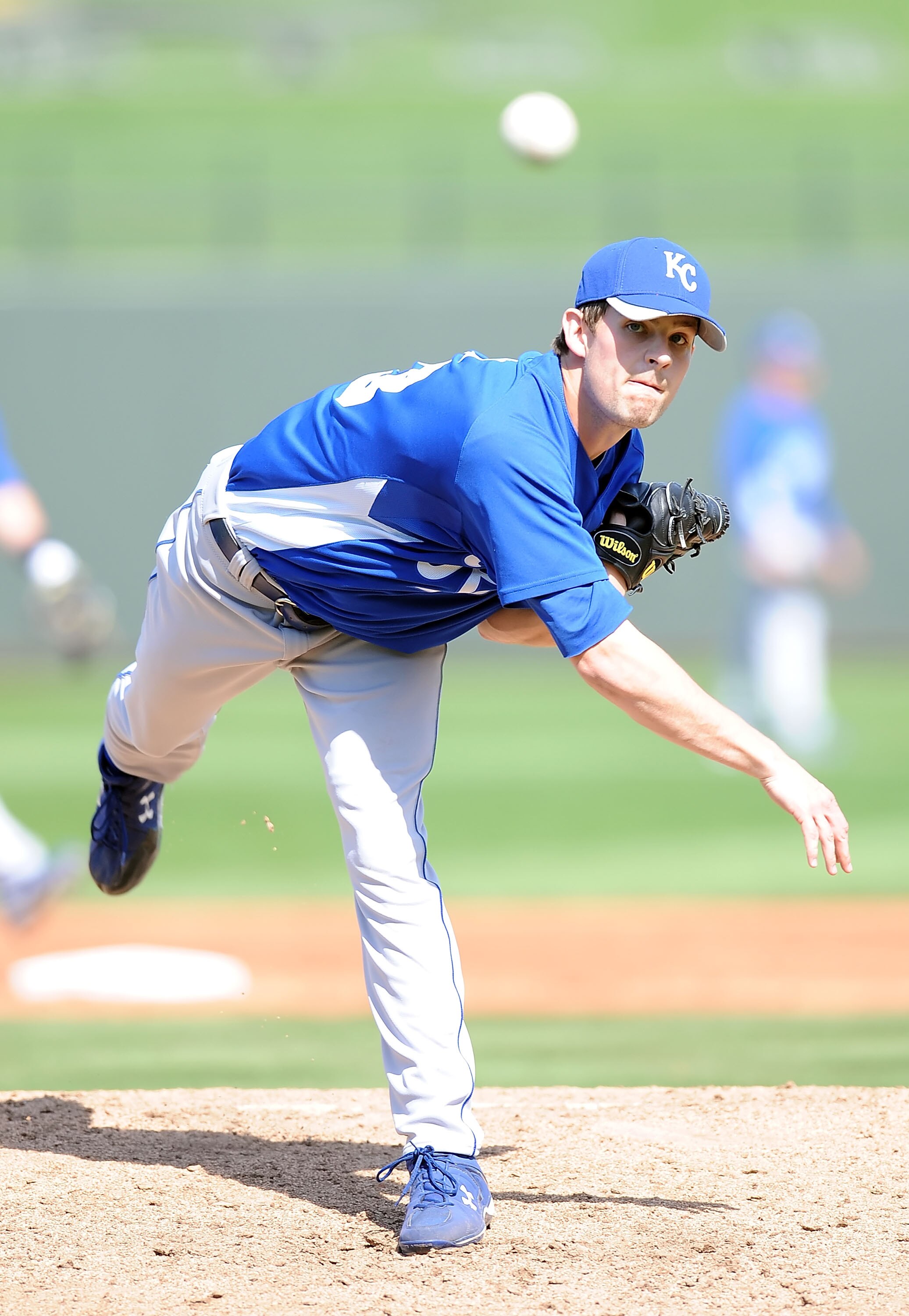 SURPRISE, AZ - MARCH 06:  Aaron Crow #43 of the Kansas City Royals pitches during a Spring Training game against the Texas Rangers on March 6, 2010 in Surprise, Arizona.  (Photo by Lisa Blumenfeld/Getty Images)