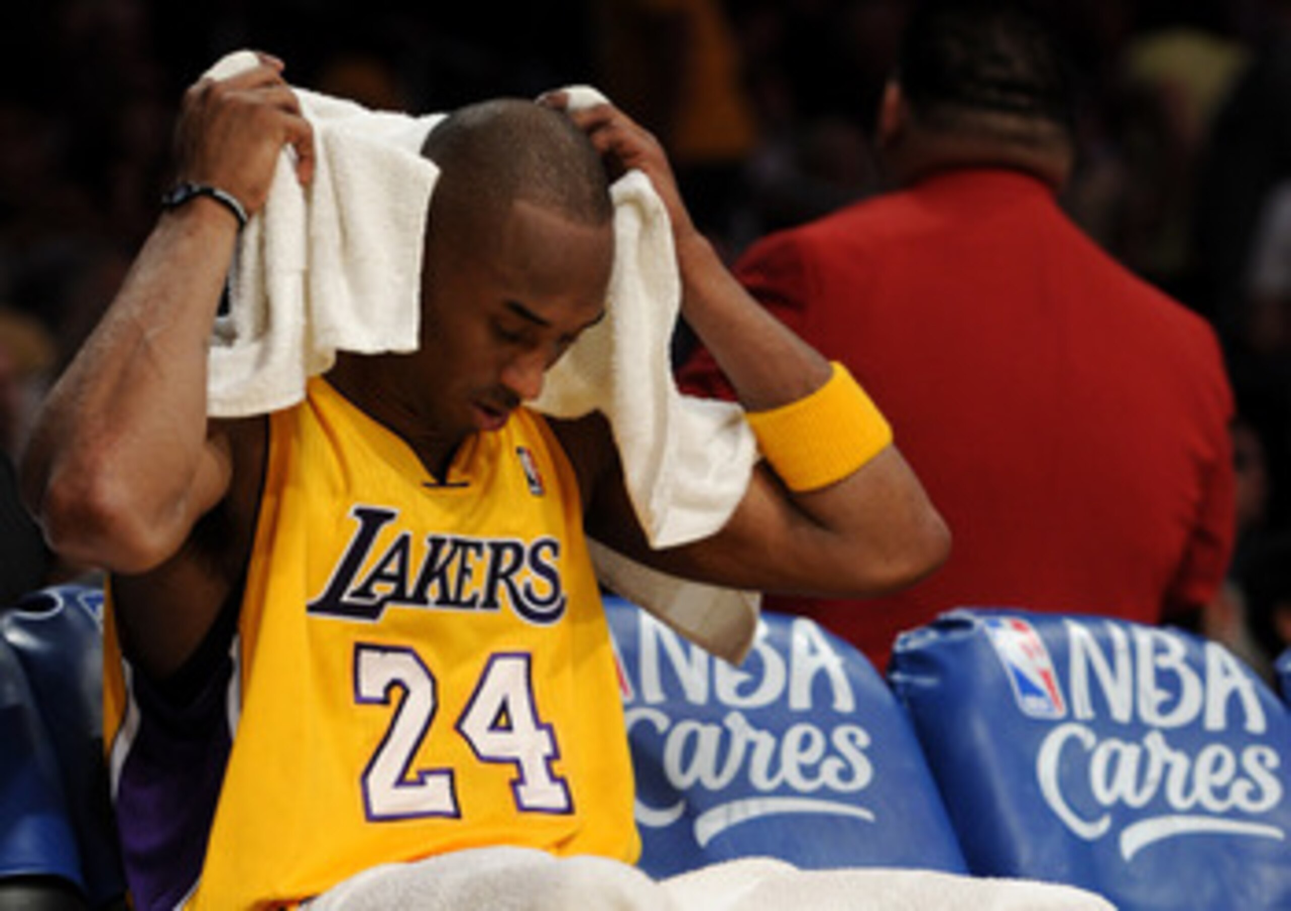 LOS ANGELES, CA - APRIL 26:  Kobe Bryant #24 of the Los Angeles Lakers reacts from the bench at the end of the first quarter while taking on the New Orleans Hornets in Game Five of the Western Conference Quarterfinals in the 2011 NBA Playoffs on April 26,
