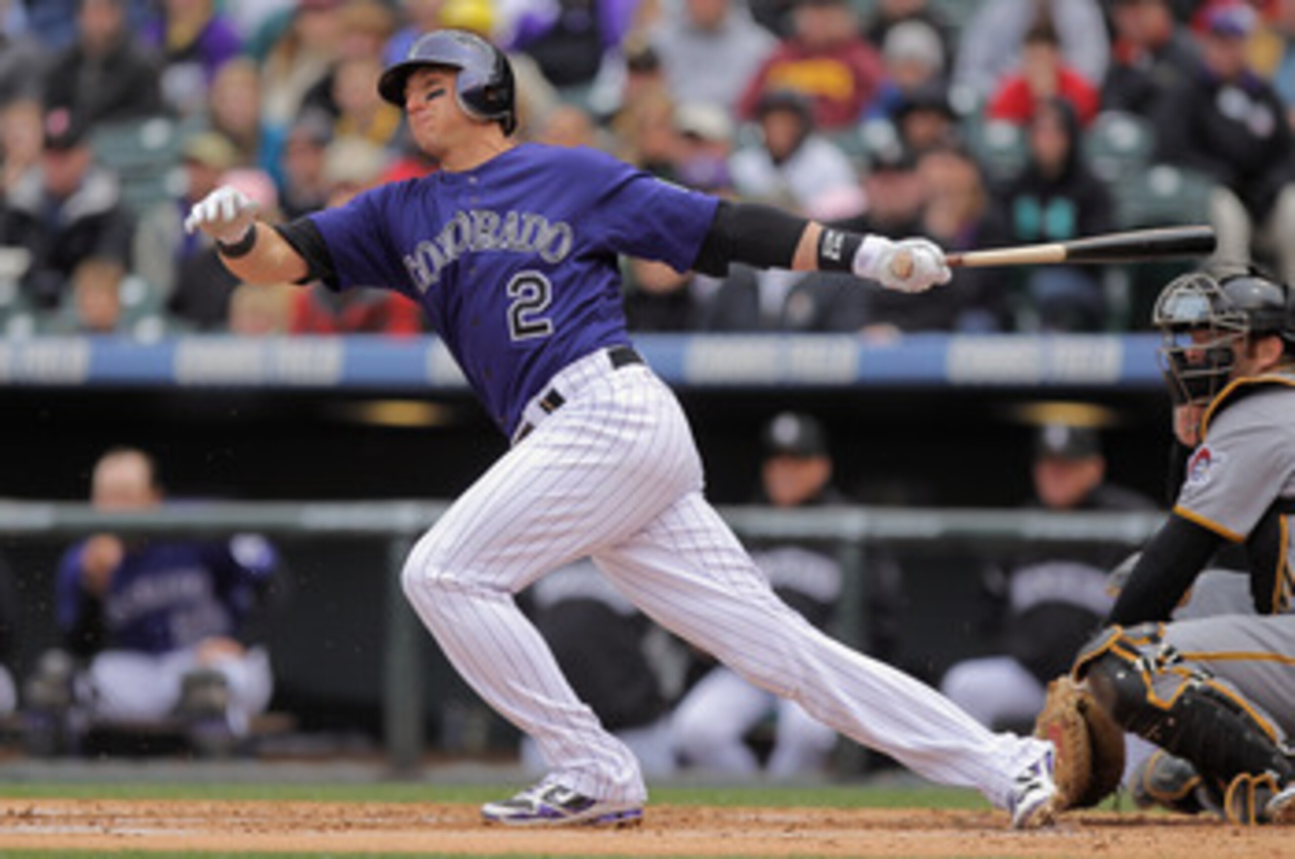 DENVER, CO - MAY 01:  Shortstop Troy Tulowitzki #2 of the Colorado Rockies takes an at bat against the Pittsburgh Pirates at Coors Field on May 1, 2011 in Denver, Colorado. The Pirates defeated the Rockies 8-4.  (Photo by Doug Pensinger/Getty Images)