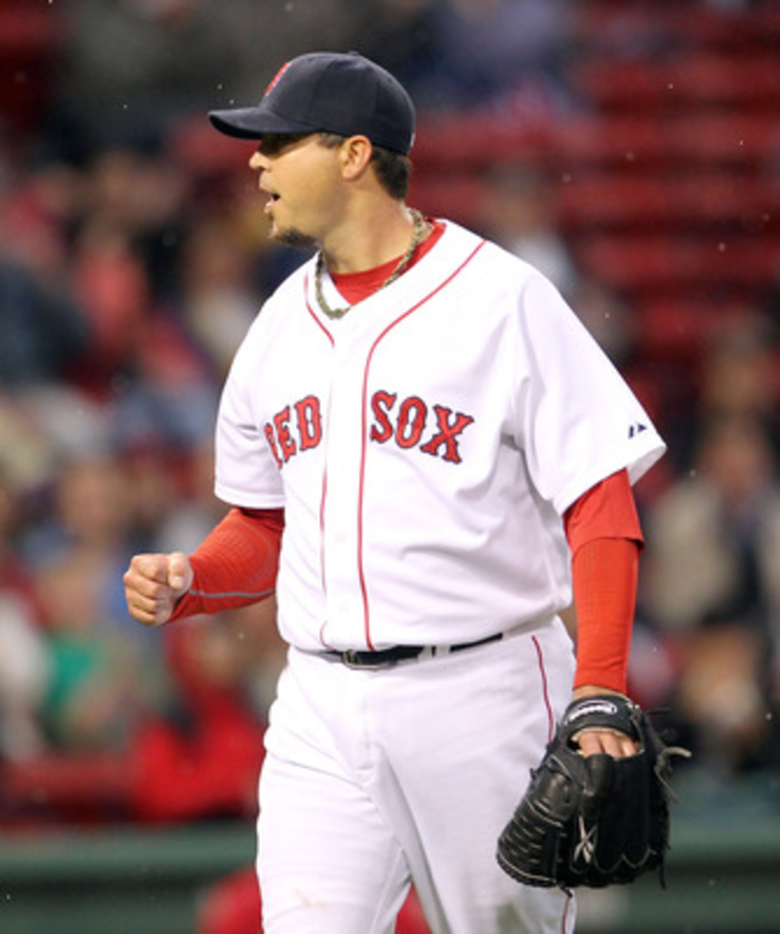 BOSTON, MA - MAY 4:  Josh Beckett #19 of the Boston Red Sox reacts after a double play in the first inning against the Los Angeles Angels of Anaheim at Fenway Park on May 4, 2011 in Boston, Massachusetts. (Photo by Jim Rogash/Getty Images)