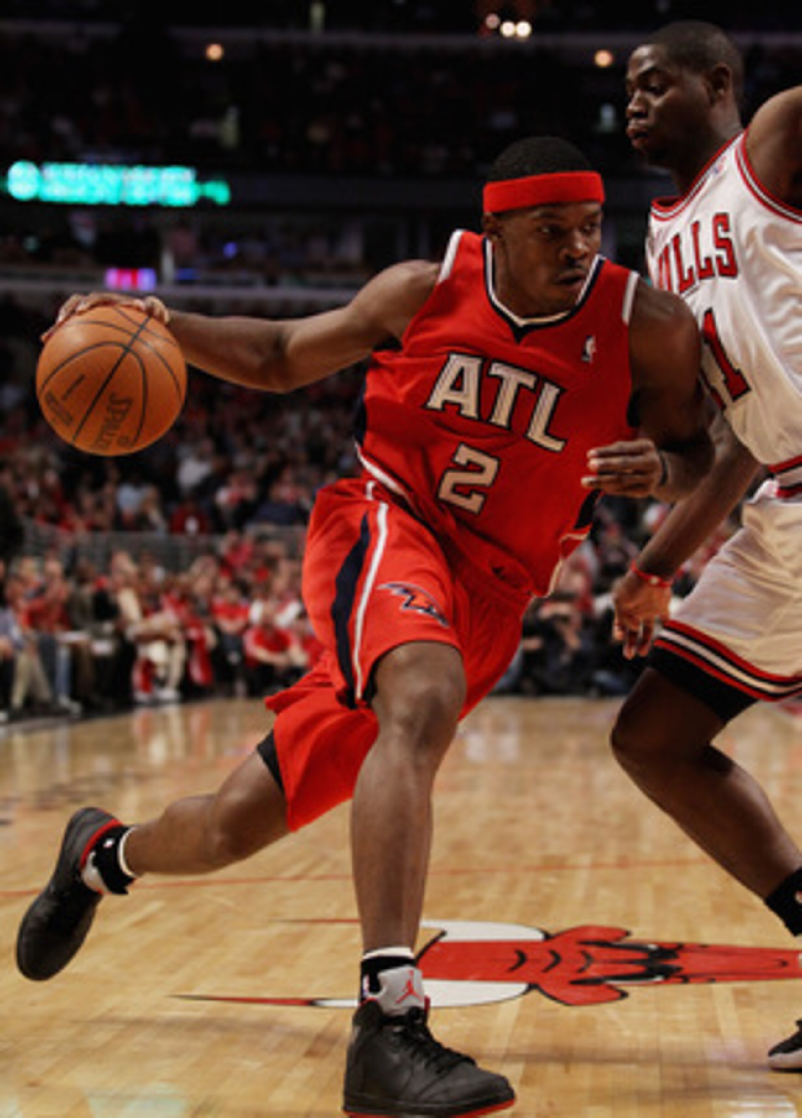 CHICAGO, IL - MAY 04: Joe Johnson #2 of the Atlanta Hawks moves against Ronnie Brewer #11 of the Chicago Bulls in Game Two of the Eastern Conference Semifinals in the 2011 NBA Playoffs at the United Center on May 4, 2011 in Chicago, Illinois. The Bulls de