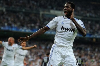MADRID, SPAIN - APRIL 05:  Emmanuel Adebayor of Real Madrid celebrates scoring his second goal during the UEFA Champions League quarter final first leg match between Real Madrid and Tottenham Hotspur at Estadio Santiago Bernabeu on April 5, 2011 in Madrid