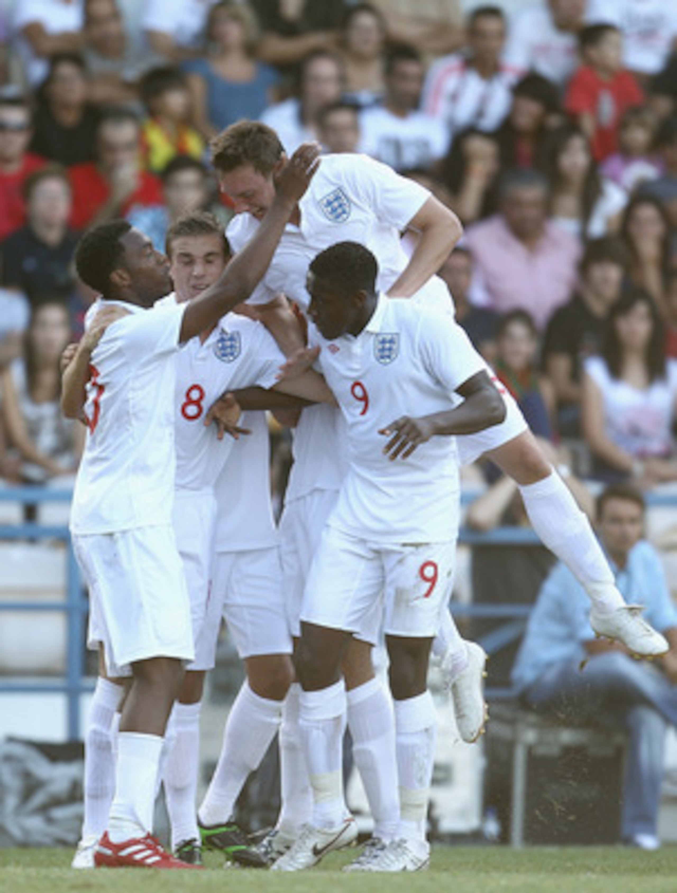 BARCELOS, PORTUGAL - SEPTEMBER 03:  Daniel Sturridge of England celebrates with Jordan his team-mates after scoring the first goal for England during the UEFA U21 Championship qualifying match between Portugal U21's and England U21's at Estadio Cidade de 