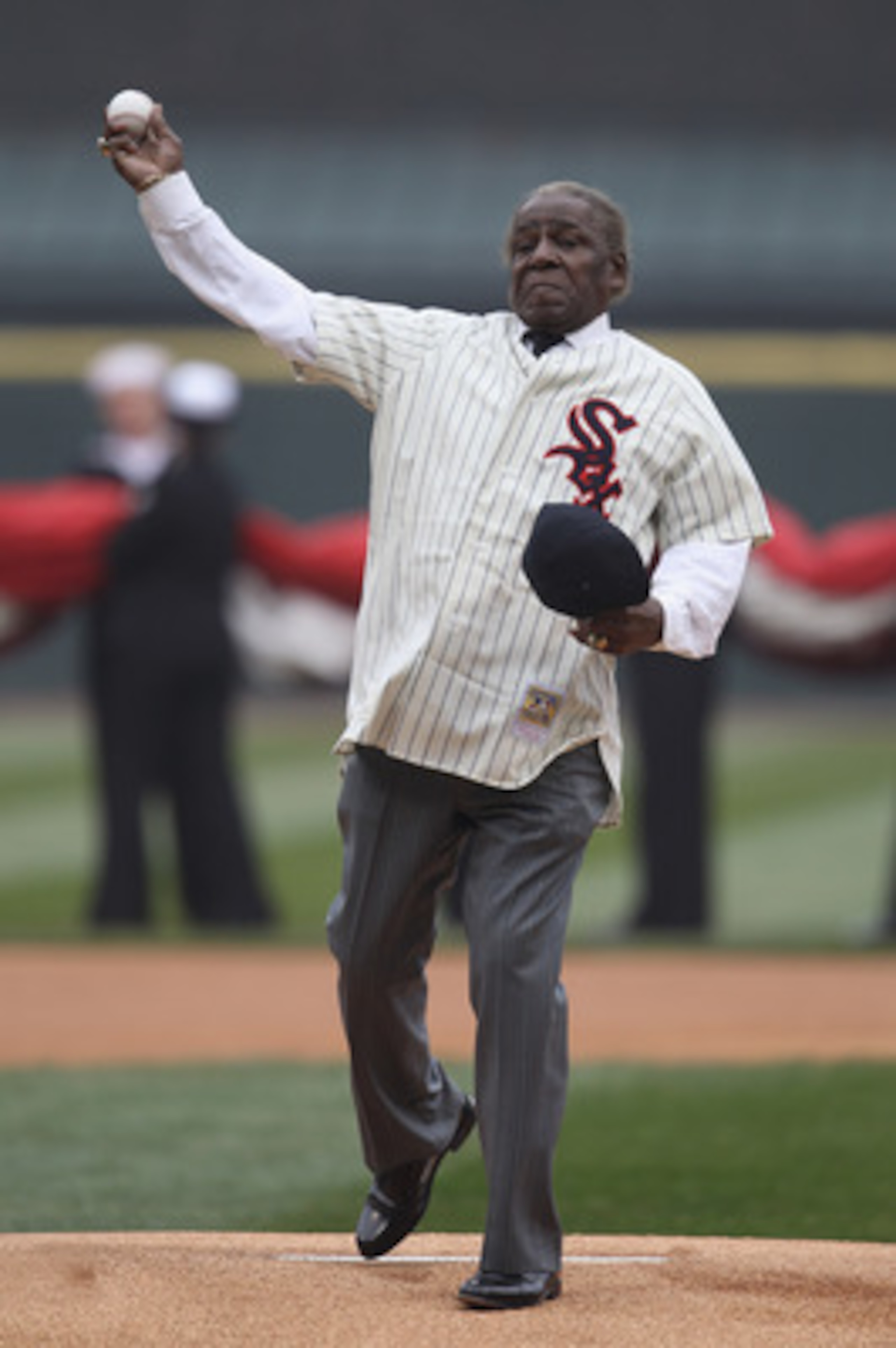 CHICAGO, IL - APRIL 07: Six time All-Star Minnie Minoso throws out a ceremonial first pitch before the home opener between the Chicago White Sox and the Tampa Bay Rays at U.S. Cellular Field on April 7, 2011 in Chicago, Illinois. (Photo by Jonathan Daniel
