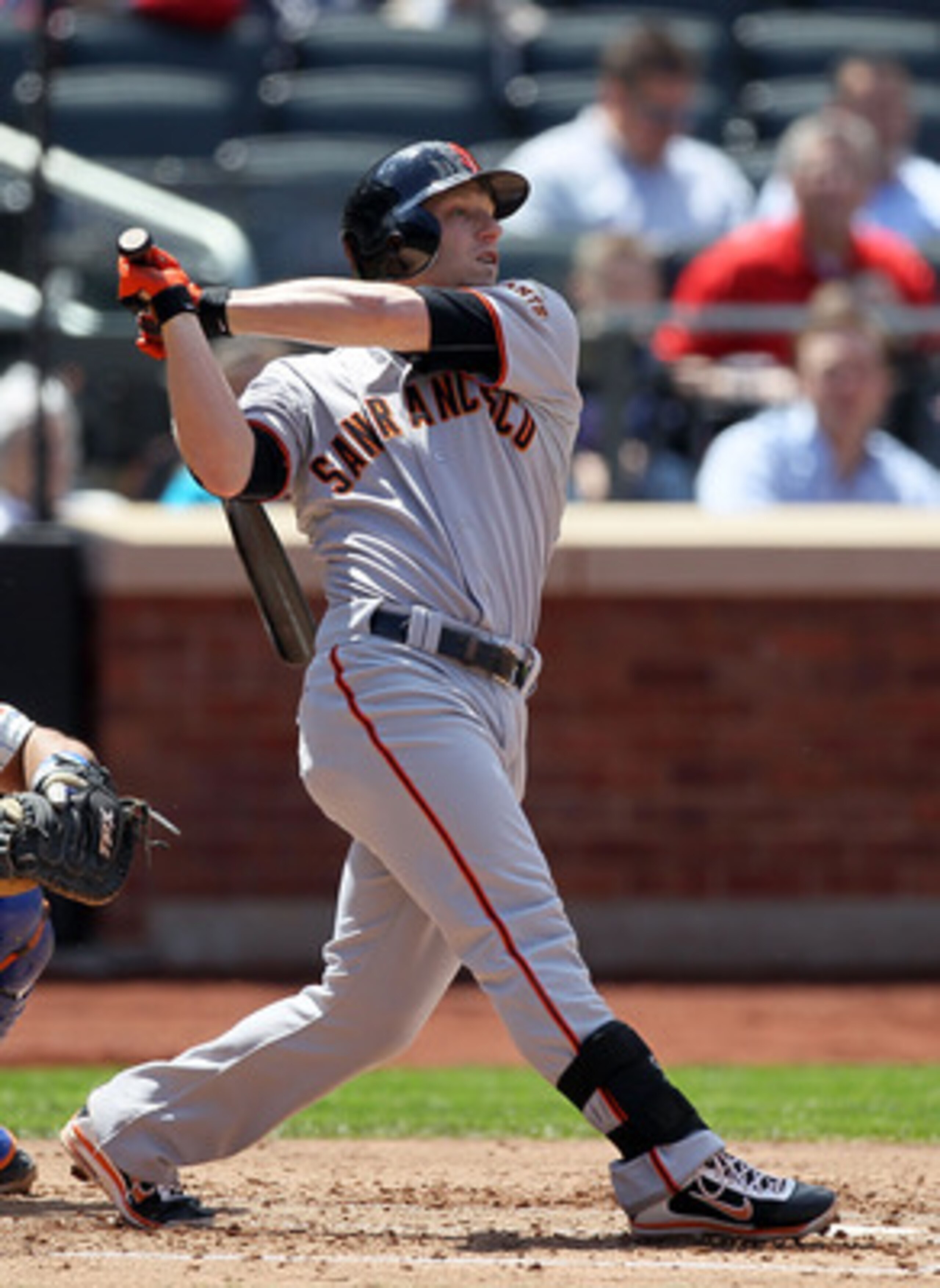 NEW YORK, NY - MAY 05:  Mike Fontenot #14 of the San Francisco Giants hits a fourth inning home run against the New York Mets on May 5, 2011 at Citi Field in the Flushing neighborhood of the Queens borough of New York City.  (Photo by Jim McIsaac/Getty Im