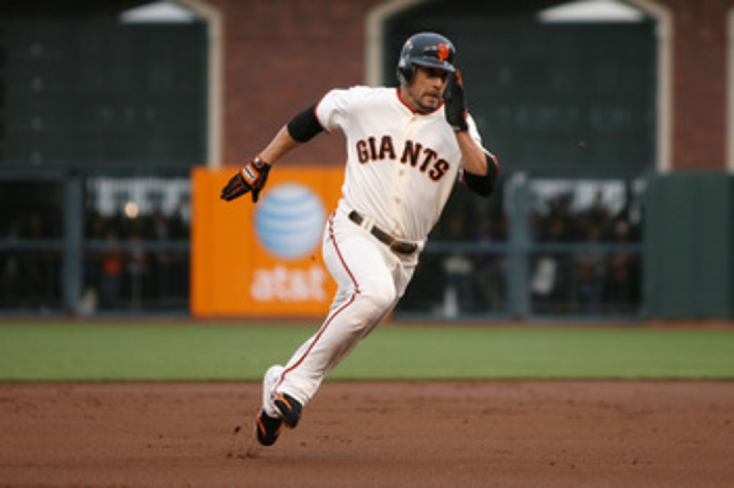 SAN FRANCISCO - OCTOBER 21:  Andres Torres #56 of the San Francisco Giants rounds second base on a single by Freddy Sanchez #21 in the first inning of Game Five of the NLCS during the 2010 MLB Playoffs at AT&T Park on October 21, 2010 in San Francisco, Ca