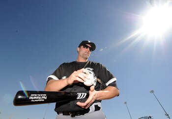 PHOENIX, AZ - FEBRUARY 28:  Paul Konerko #14 of the Chicago White Sox signs an autograph before the game against the Los Angeles Dodgers during spring training at Camelback Ranch on February 28, 2011 in Phoenix, Arizona.  (Photo by Harry How/Getty Images)