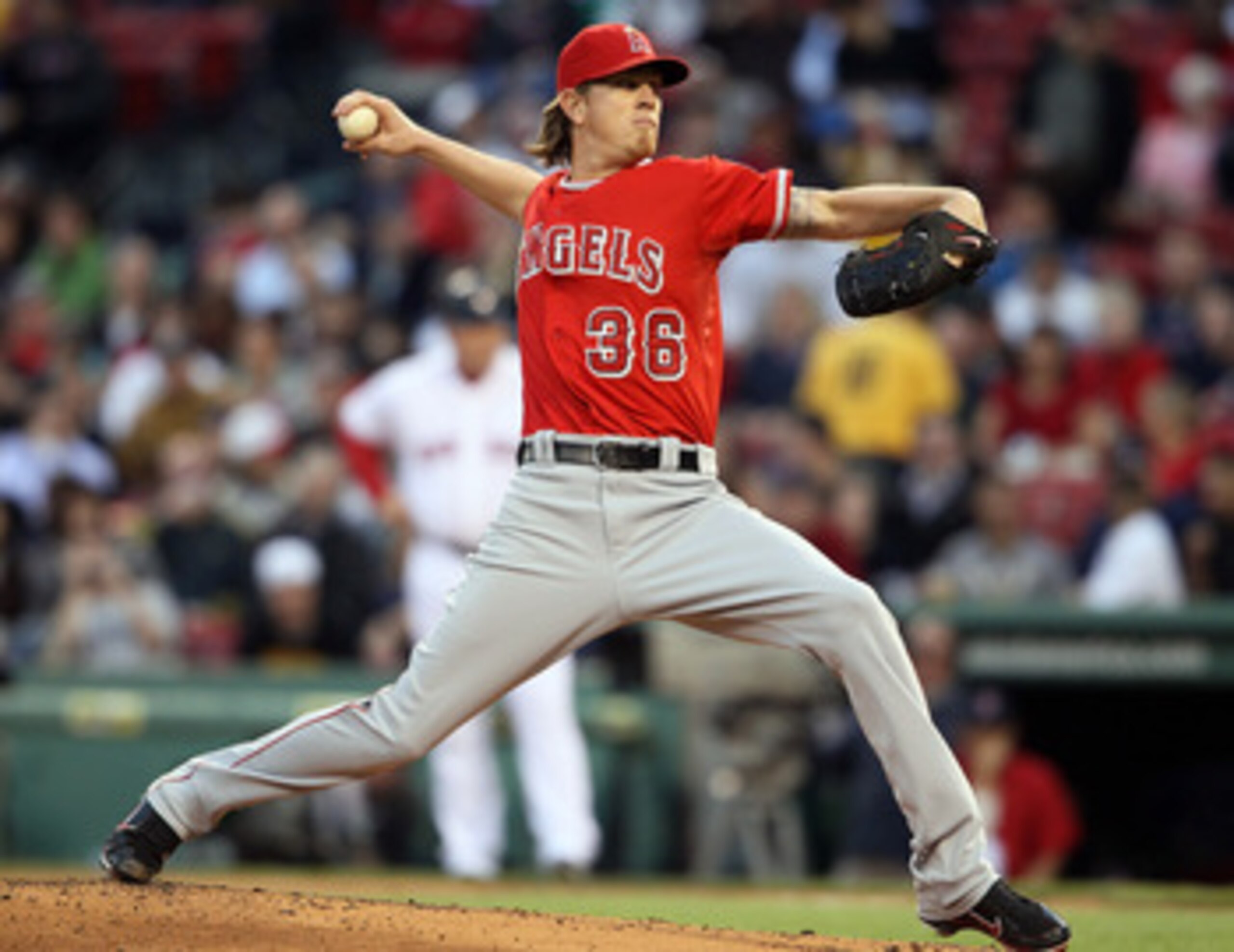 BOSTON, MA - MAY 02:  Jered Weaver #36 of the Los Angeles Angels delivers a pitch in the first inning against the Boston Red Sox on May 2, 2011 at Fenway Park in Boston, Massachusetts.  (Photo by Elsa/Getty Images)