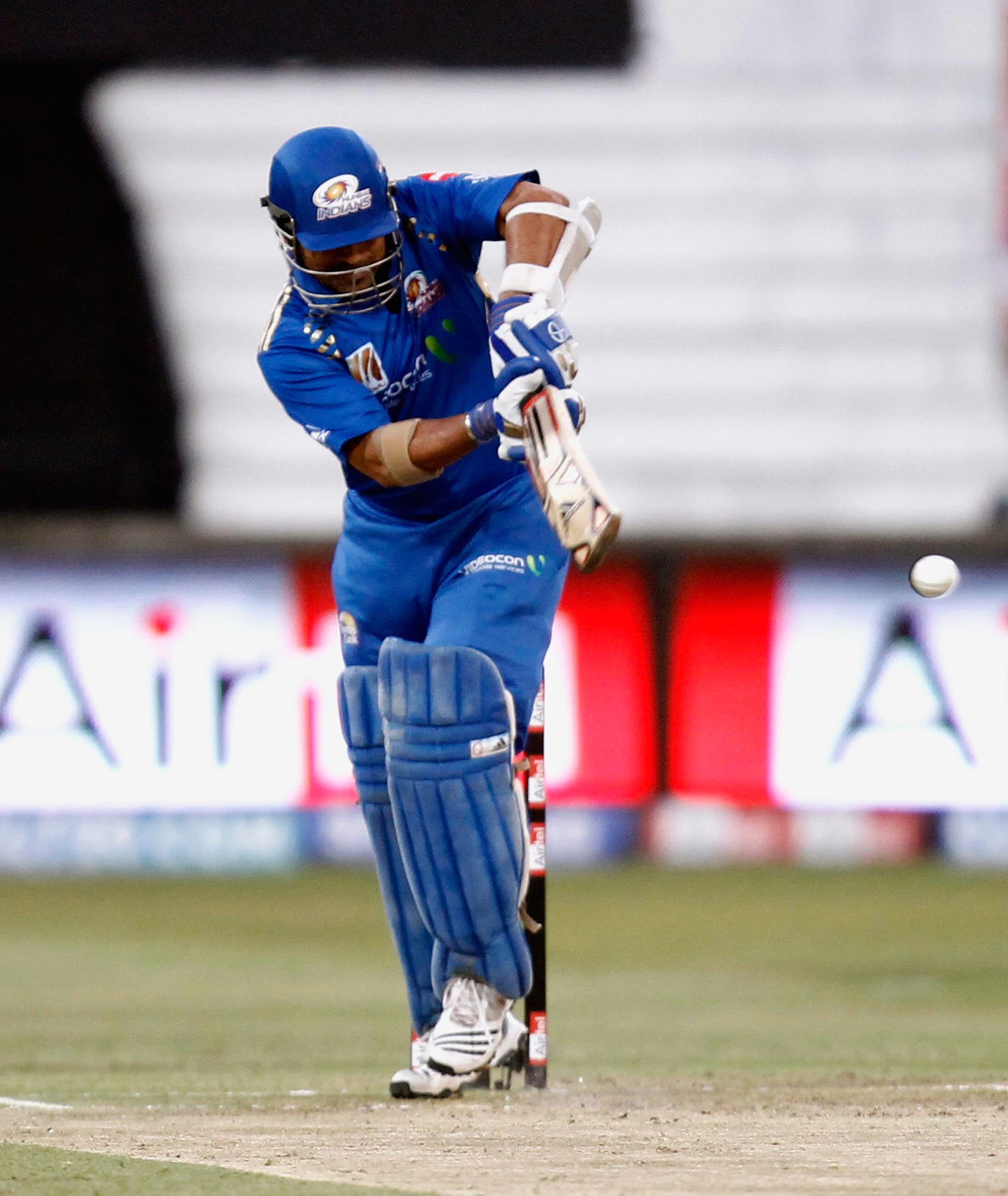DURBAN, SOUTH AFRICA - SEPTEMBER 19: Sachin Tendulkar of the Mumbai Indians of hits out during the Airtel Champions League Twenty20 match between Mumbai Indians and Royal Challengers Bangalore at Sahara Stadium Kingsmead on September 19, 2010 in Durban, S