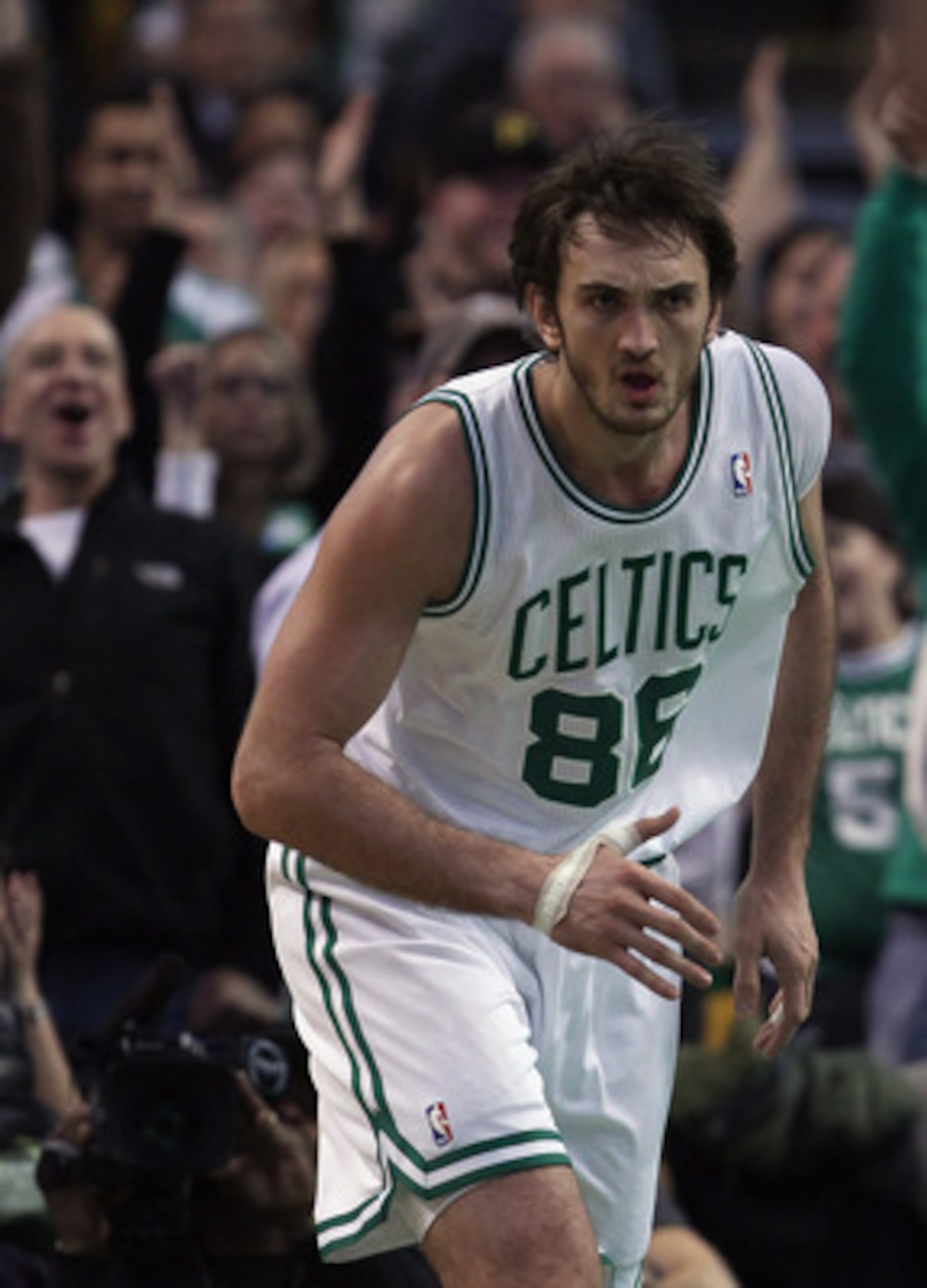 BOSTON, MA - DECEMBER 16: Semih Erden #86 of the Boston Celtics celebrates his basket against the Atlanta Hawks on December 16, 2010 at the TD Garden in Boston, Massachusetts. The Celtics defeated the Hawks 102-90. NOTE TO USER: User expressly acknowledg BOSTON, MA - DECEMBER 16: Semih Erden #86 of the Boston Celtics celebrates his basket against the Atlanta Hawks on December 16, 2010 at the TD Garden in Boston, Massachusetts. The Celtics defeated the Hawks 102-90. NOTE TO USER: User expressly acknowledg
