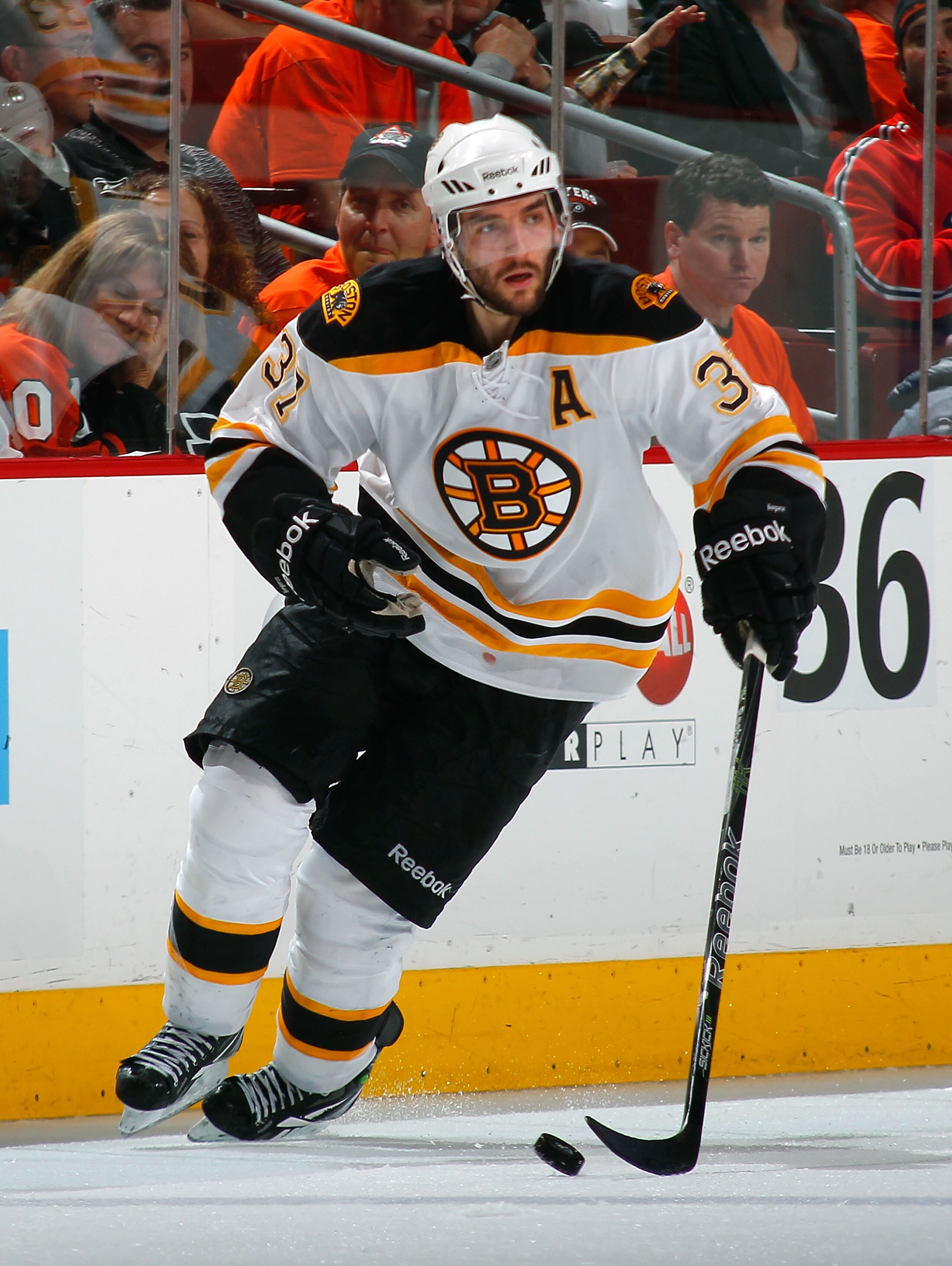 PHILADELPHIA, PA - MAY 02:  Patrice Bergeron #37 of the Boston Bruins skates during Game Two of the Eastern Conference Semifinals against the Philadelphia Flyers during the 2011 NHL Stanley Cup Playoffs at Wells Fargo Center on May 2, 2011 in Philadelphia