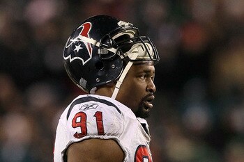 PHILADELPHIA, PA - DECEMBER 02:  Amobi Okoye #91 of the Houston Texans looks on against the Philadelphia Eagles at Lincoln Financial Field on December 2, 2010 in Philadelphia, Pennsylvania.  (Photo by Jim McIsaac/Getty Images)