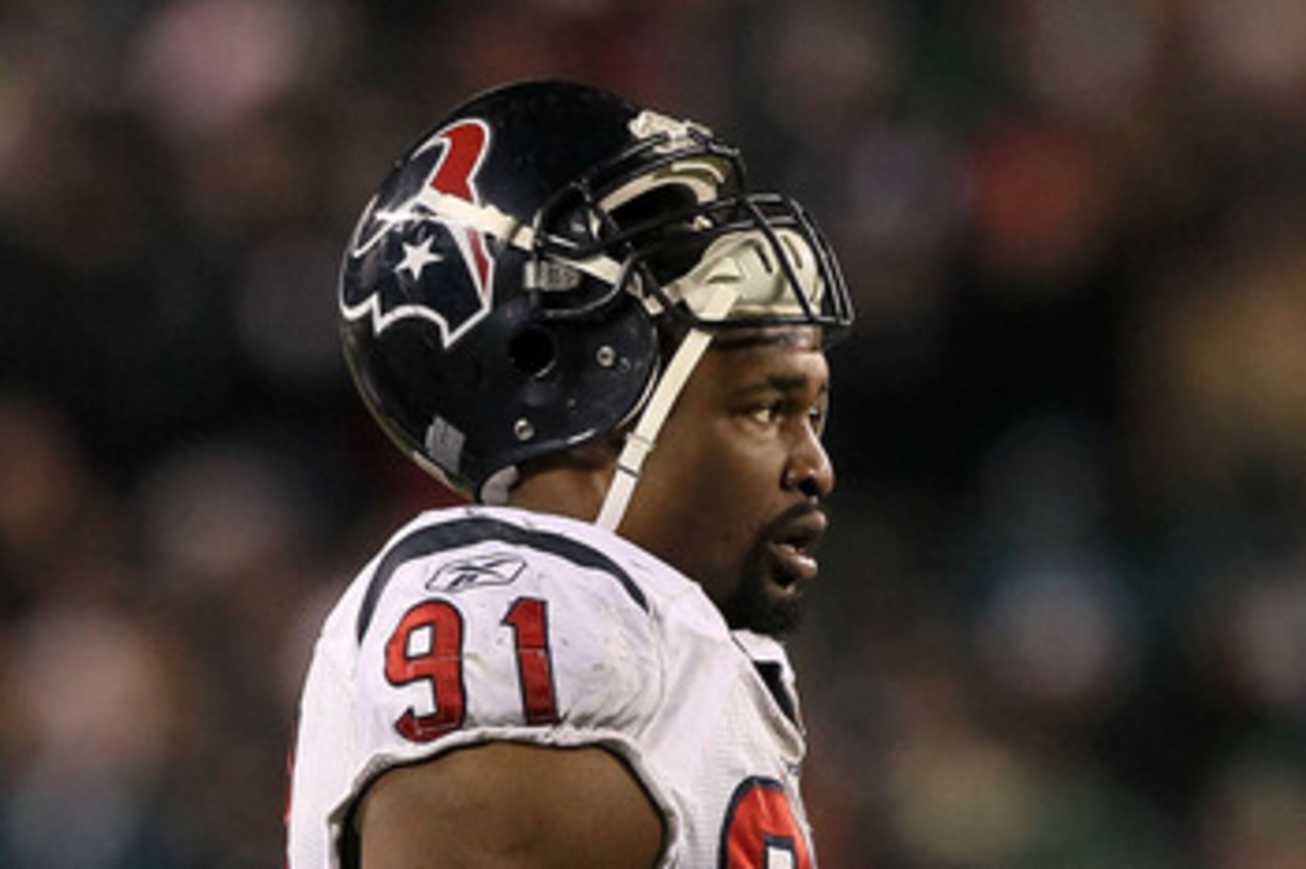 PHILADELPHIA, PA - DECEMBER 02:  Amobi Okoye #91 of the Houston Texans looks on against the Philadelphia Eagles at Lincoln Financial Field on December 2, 2010 in Philadelphia, Pennsylvania.  (Photo by Jim McIsaac/Getty Images)